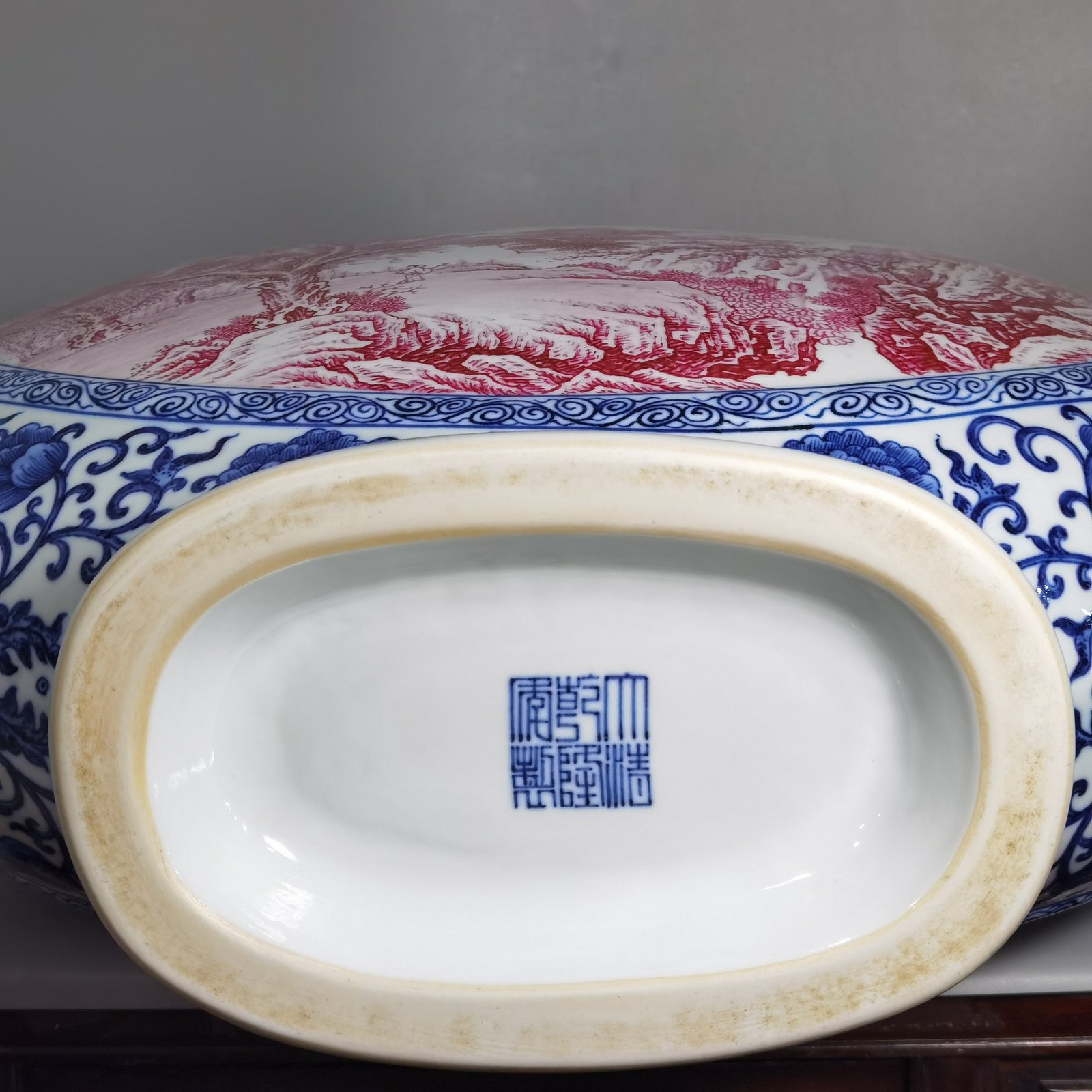 Qing Dynasty Qianlong blue and white enamel agate and red landscape figures flat bottle