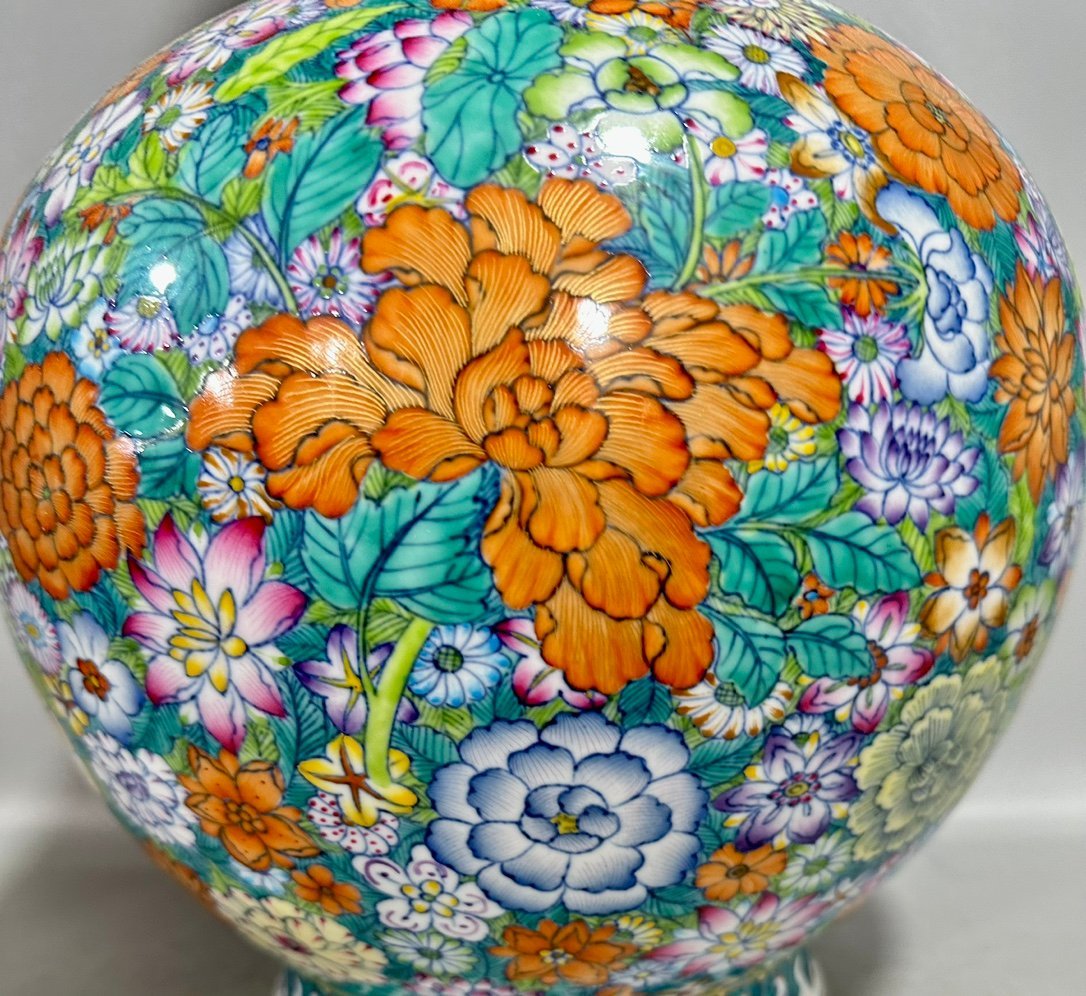 Qing Dynasty Qianlong blue and white gourd vase with multi-coloured patterns and ten thousand flowers