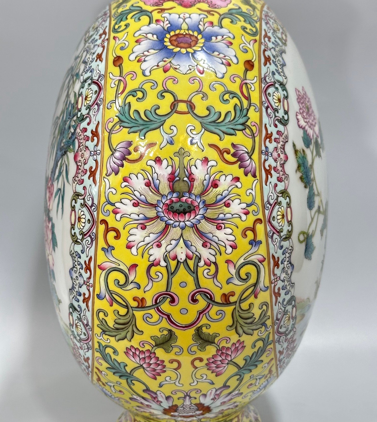 Qing Dynasty Qianlong Yangcai yellow ground flowers entwining branches double ears holding the moon vase