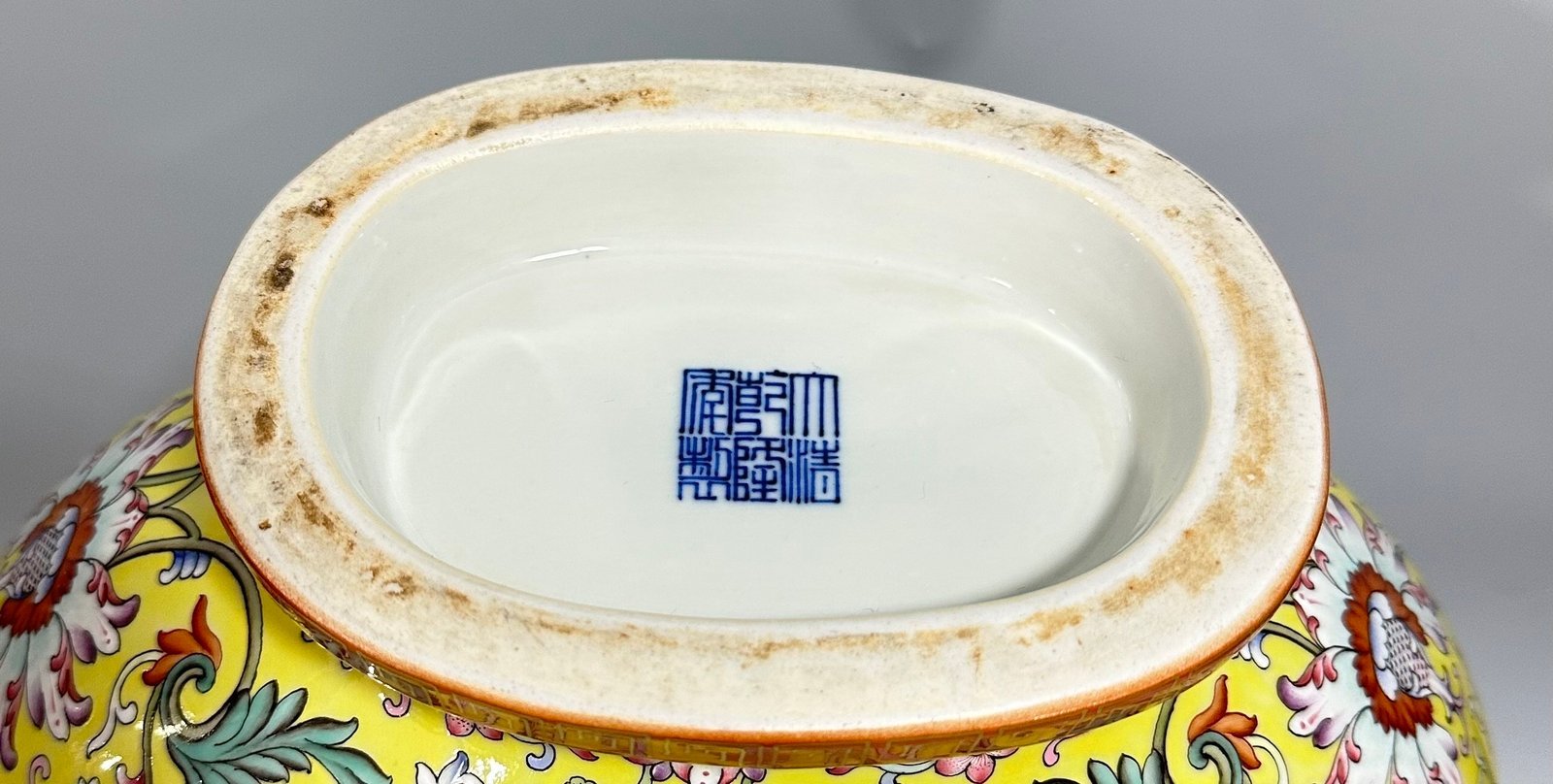 Qing Dynasty Qianlong Yangcai yellow ground flowers entwining branches double ears holding the moon vase