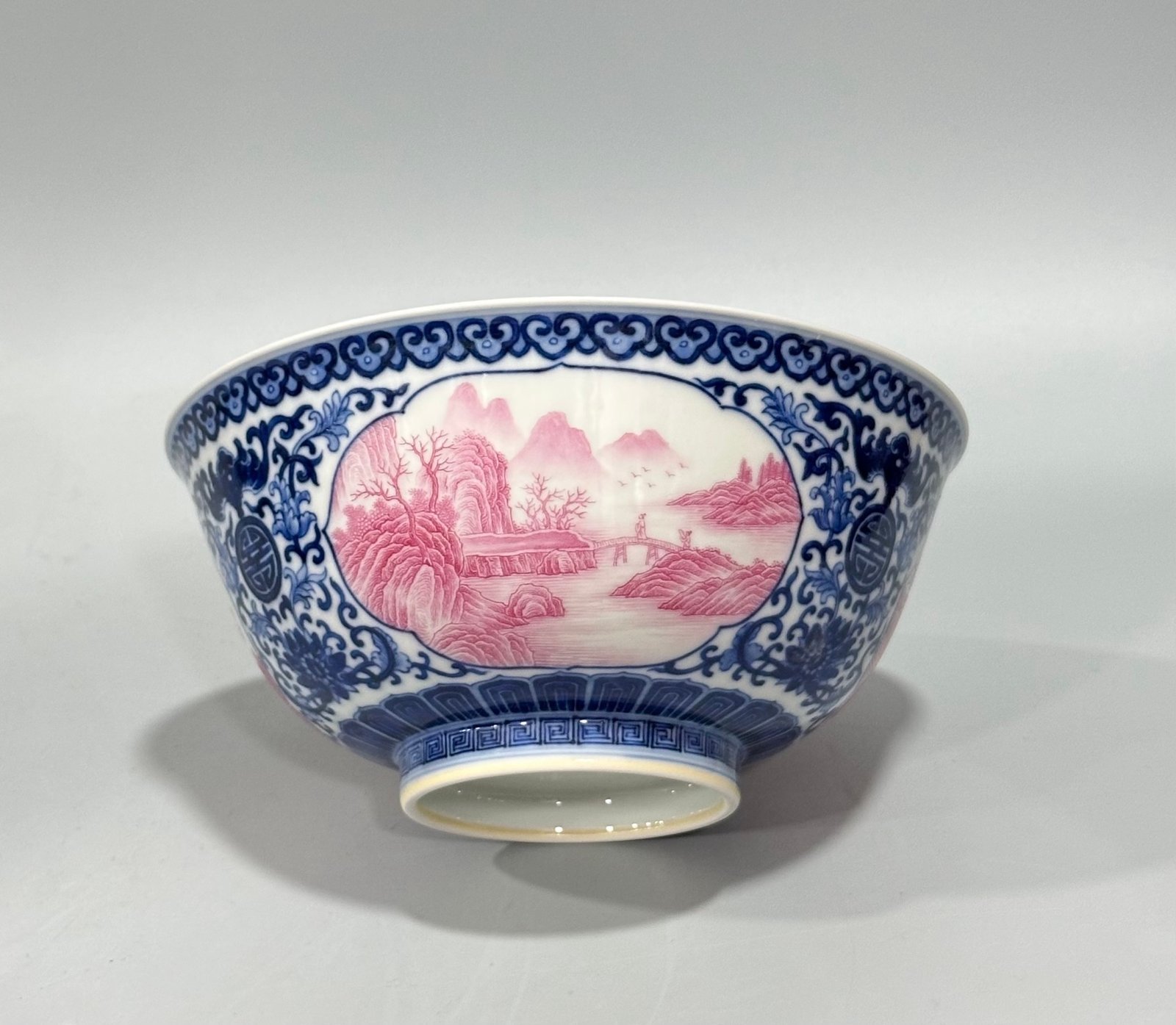Qing Dynasty Qianlong Enamel blue and whit longevity flowers agate red landscape pavilion bowl