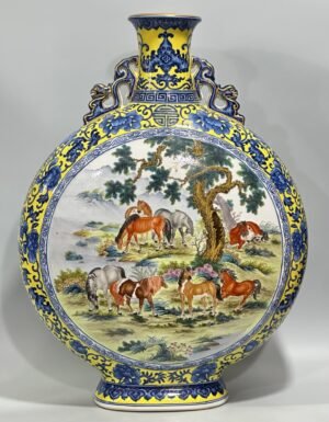 Qing Dynasty Qianlong Enamel vase with blue and white flowers on yellow ground