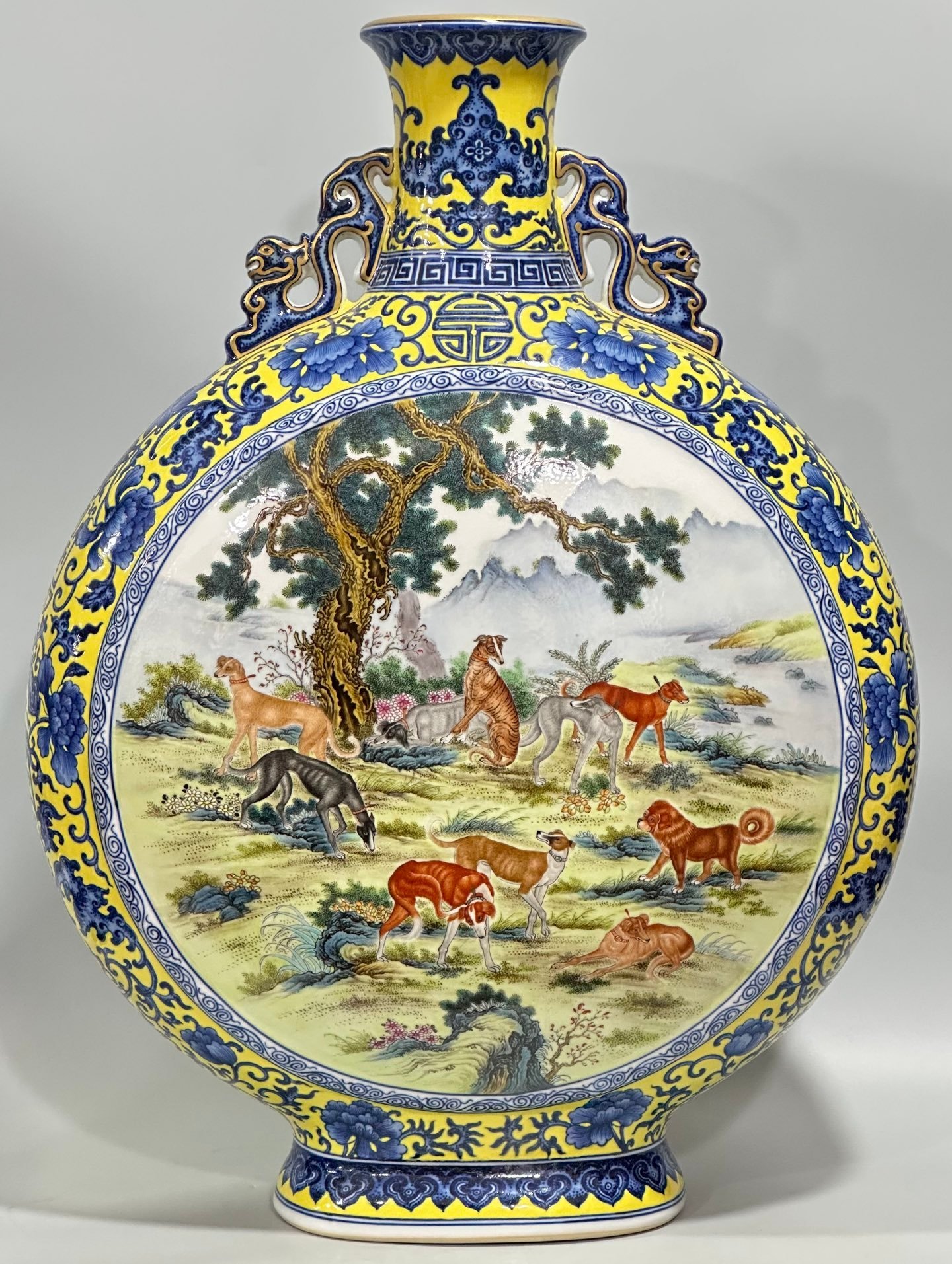 Qing Dynasty Qianlong Enamel vase with blue and white flowers on yellow ground