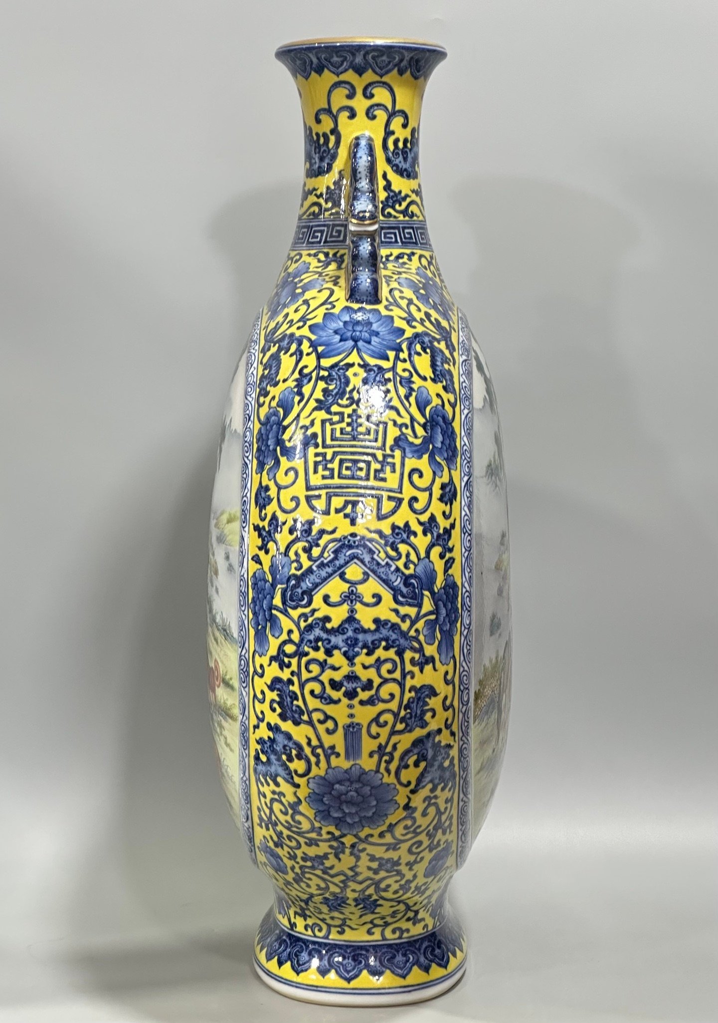 Qing Dynasty Qianlong Enamel vase with blue and white flowers on yellow ground
