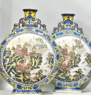 Qing Dynasty Qianlong Enamel yellow ground blue and white flowers two ears holding the moon vase