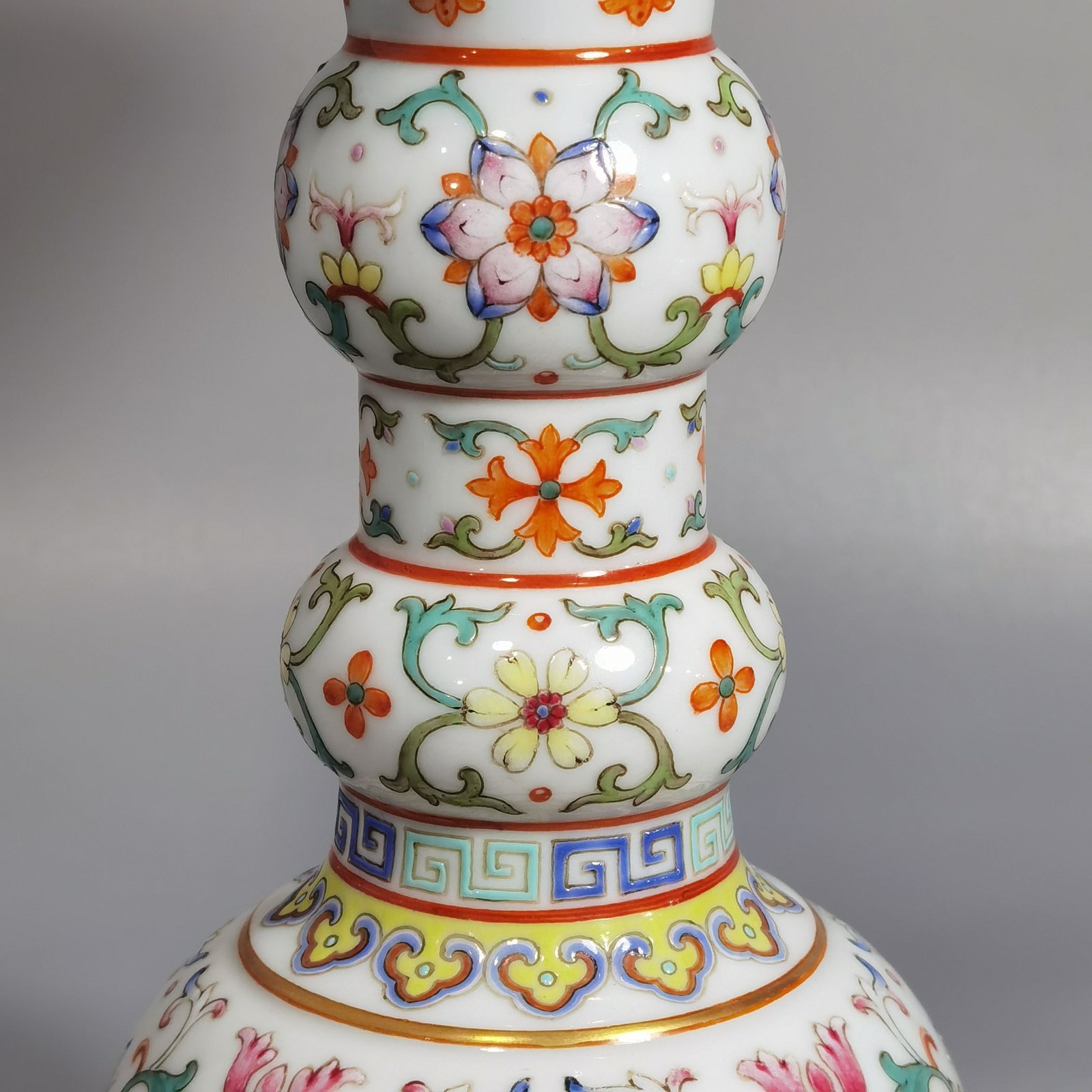 Qing Dynasty Qianlong a pair of white ground pastel painted gold-wrapped branches