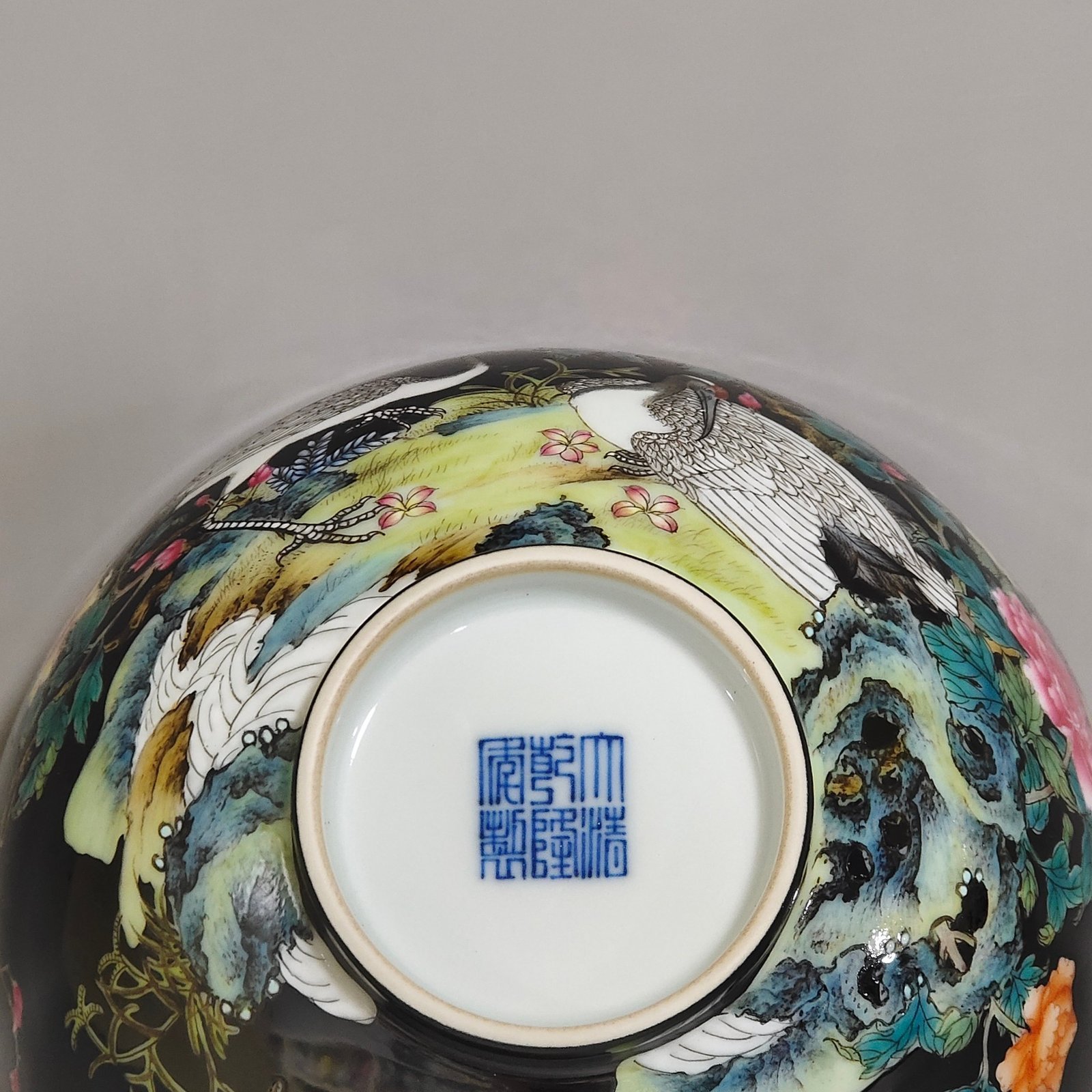Qing Dynasty Qianlong black gold glazed red-crowned crane and flower poetry bowl