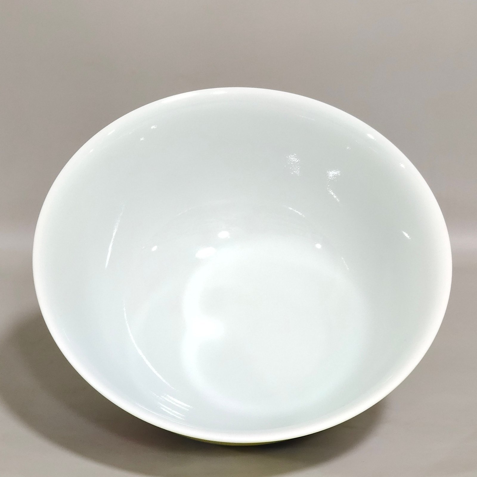 Qing Dynasty Qianlong yellow glaze flower bowl with multiple characters