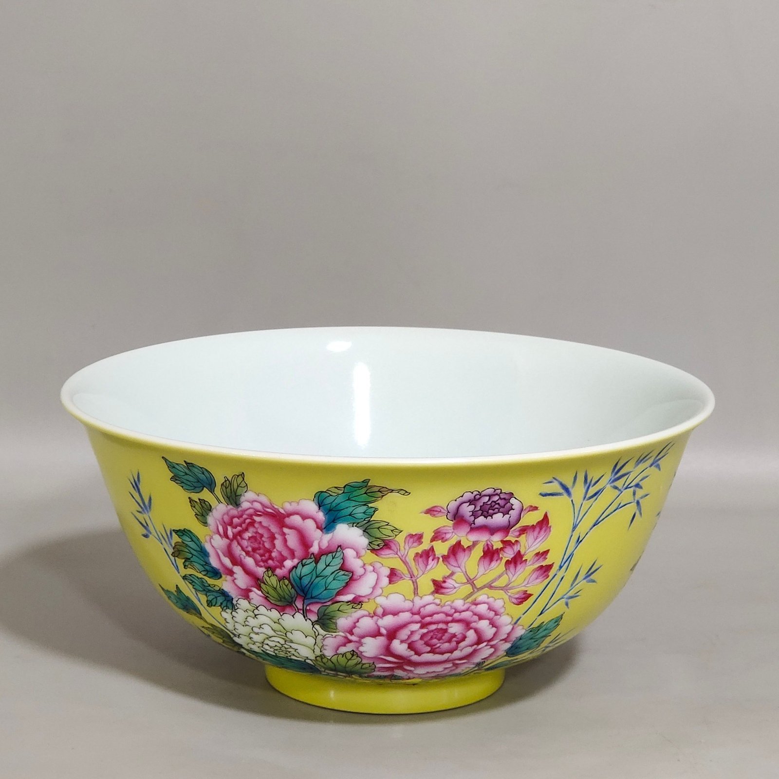 Qing Dynasty Qianlong yellow glaze flower bowl with multiple characters