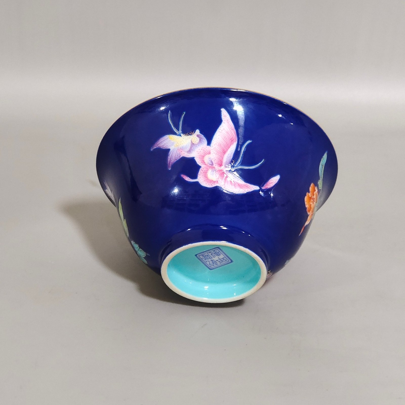 Qing Dynasty Qianlong sapphire blue-glazed peony butterfly cup