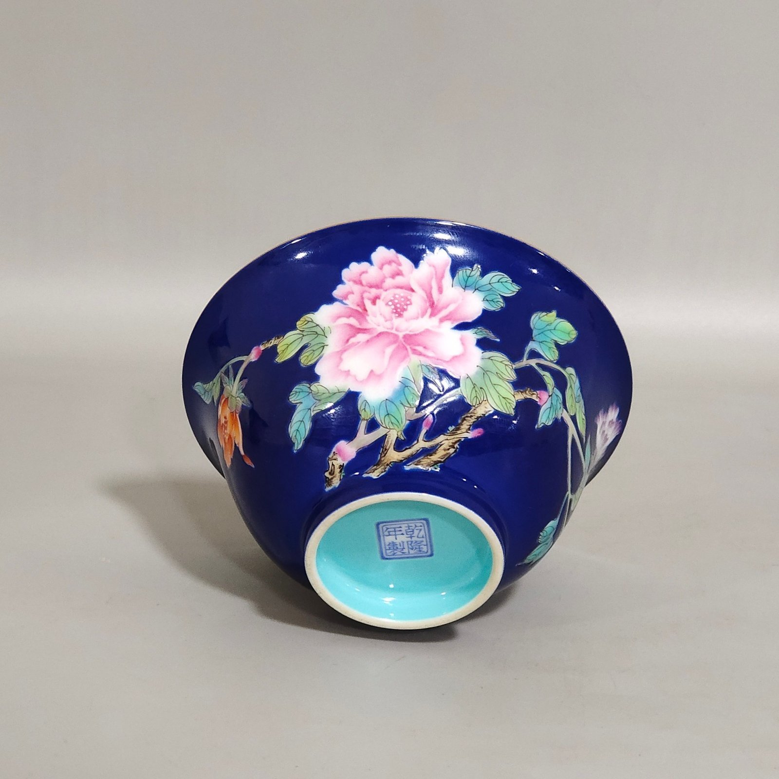Qing Dynasty Qianlong sapphire blue-glazed peony butterfly cup