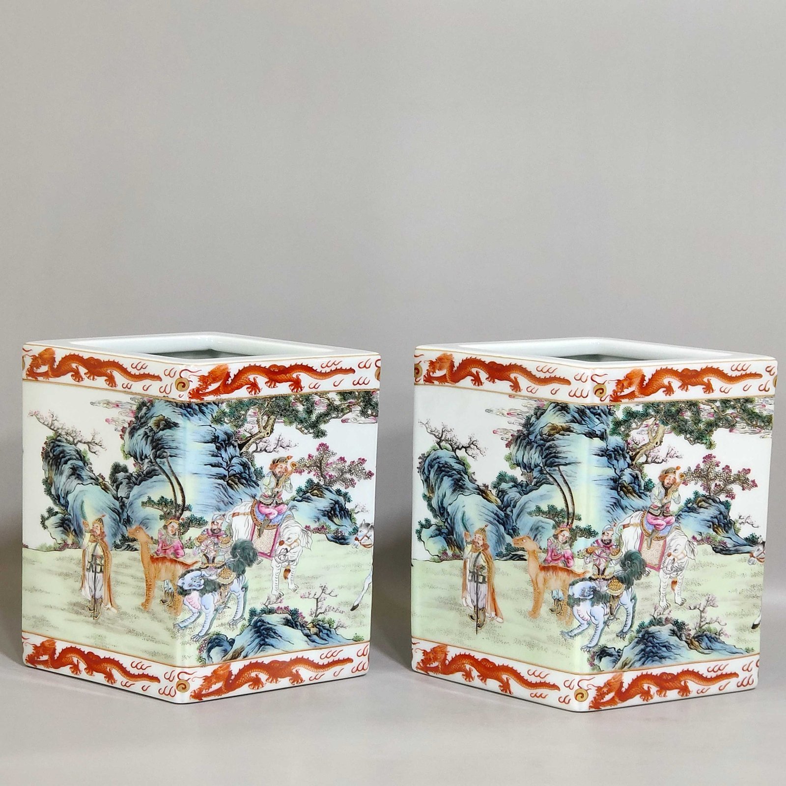 Qing Dynasty Qianlong Gong red dragon pattern square prismatic pen holder with eight barbarians