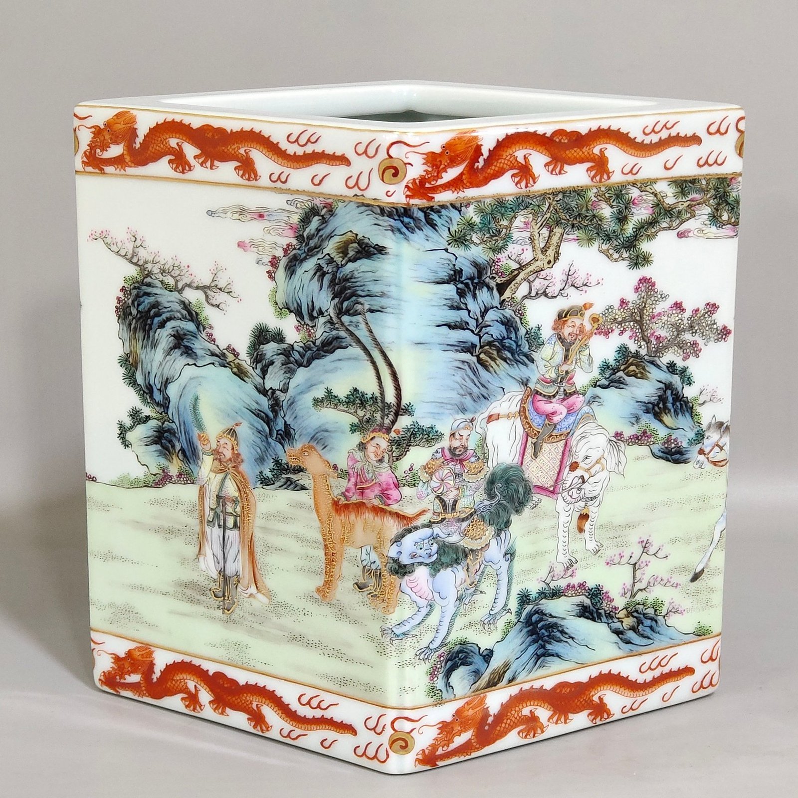 Qing Dynasty Qianlong Gong red dragon pattern square prismatic pen holder with eight barbarians