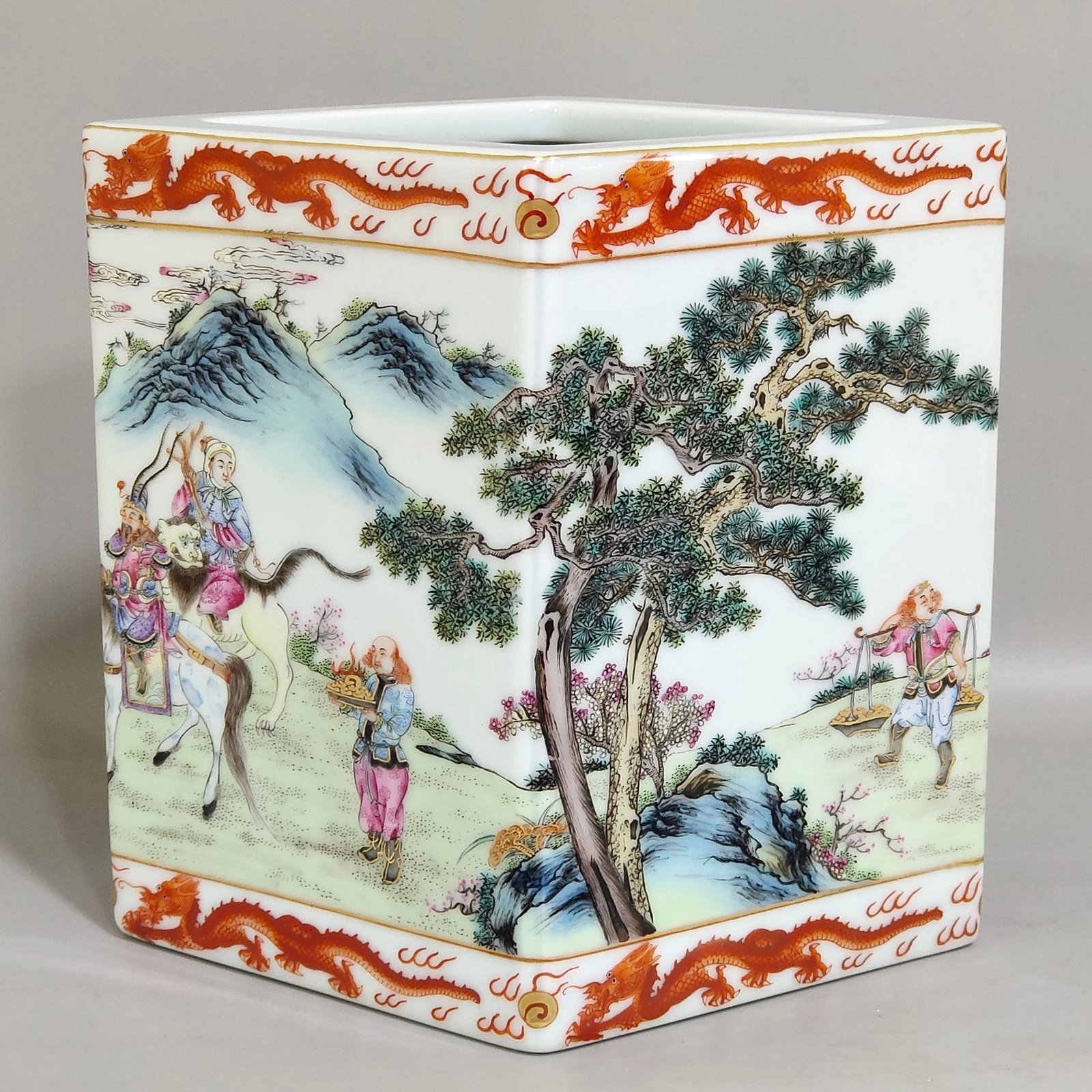 Qing Dynasty Qianlong Gong red dragon pattern square prismatic pen holder with eight barbarians