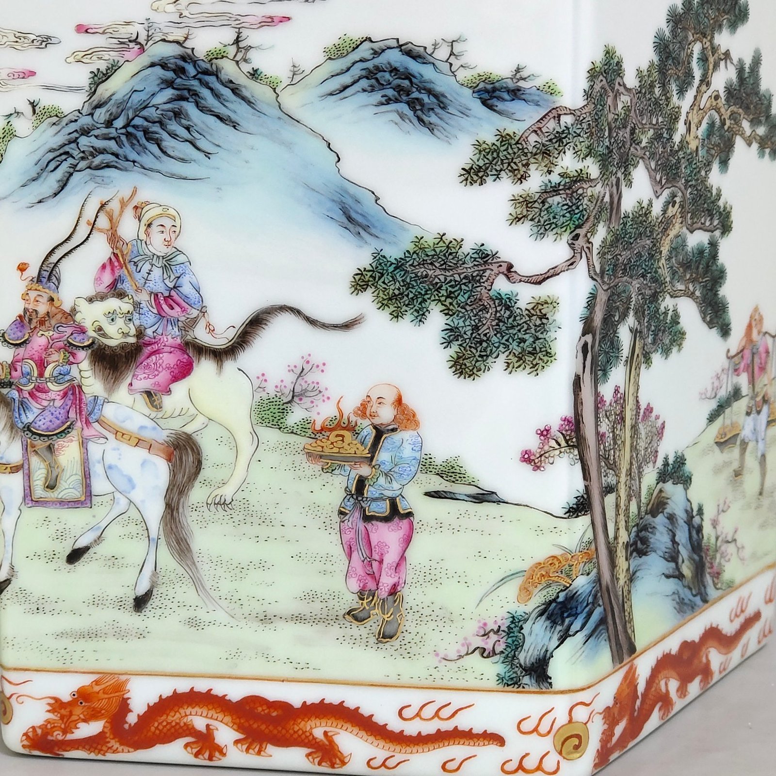 Qing Dynasty Qianlong Gong red dragon pattern square prismatic pen holder with eight barbarians