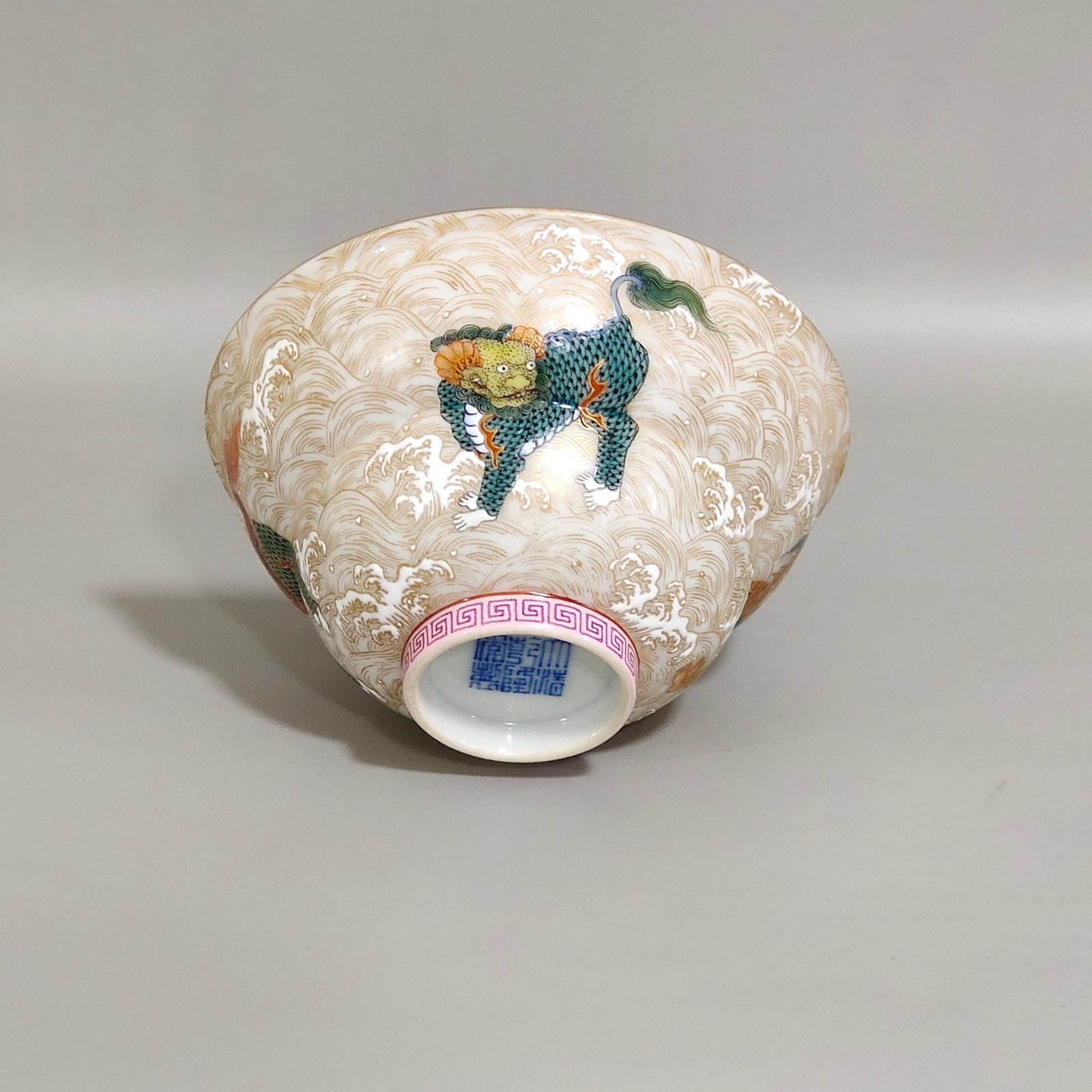 Qing Dynasty Qianlong Qilin folding cup with golden sea pattern