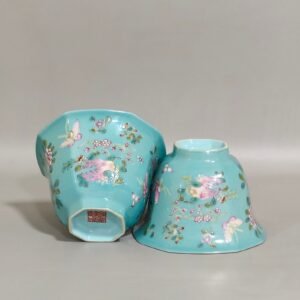 Qing Dynasty Qianlong turquoise green branched flowers and three more butterflies octagonal cup