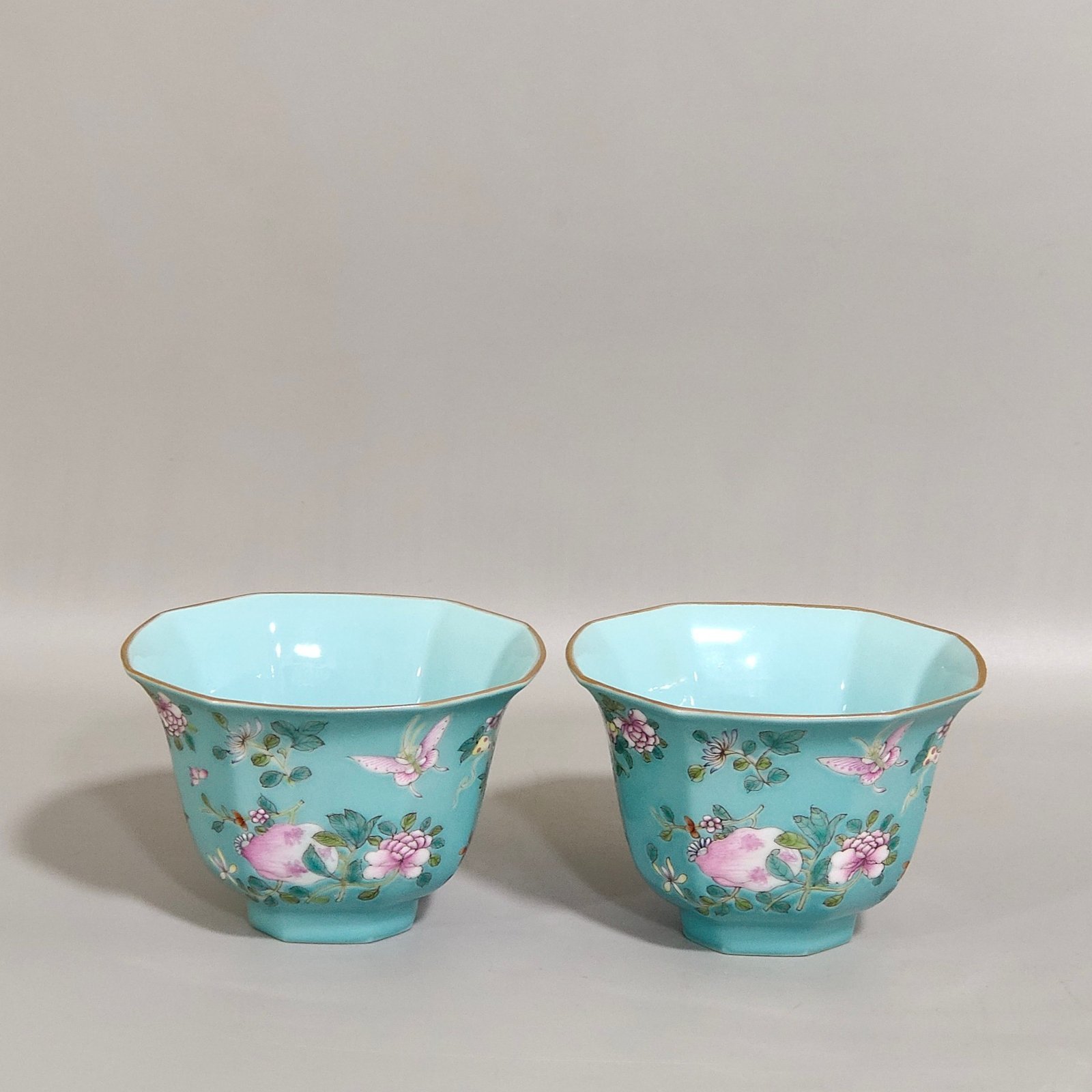 Qing Dynasty Qianlong turquoise green branched flowers and three more butterflies octagonal cup