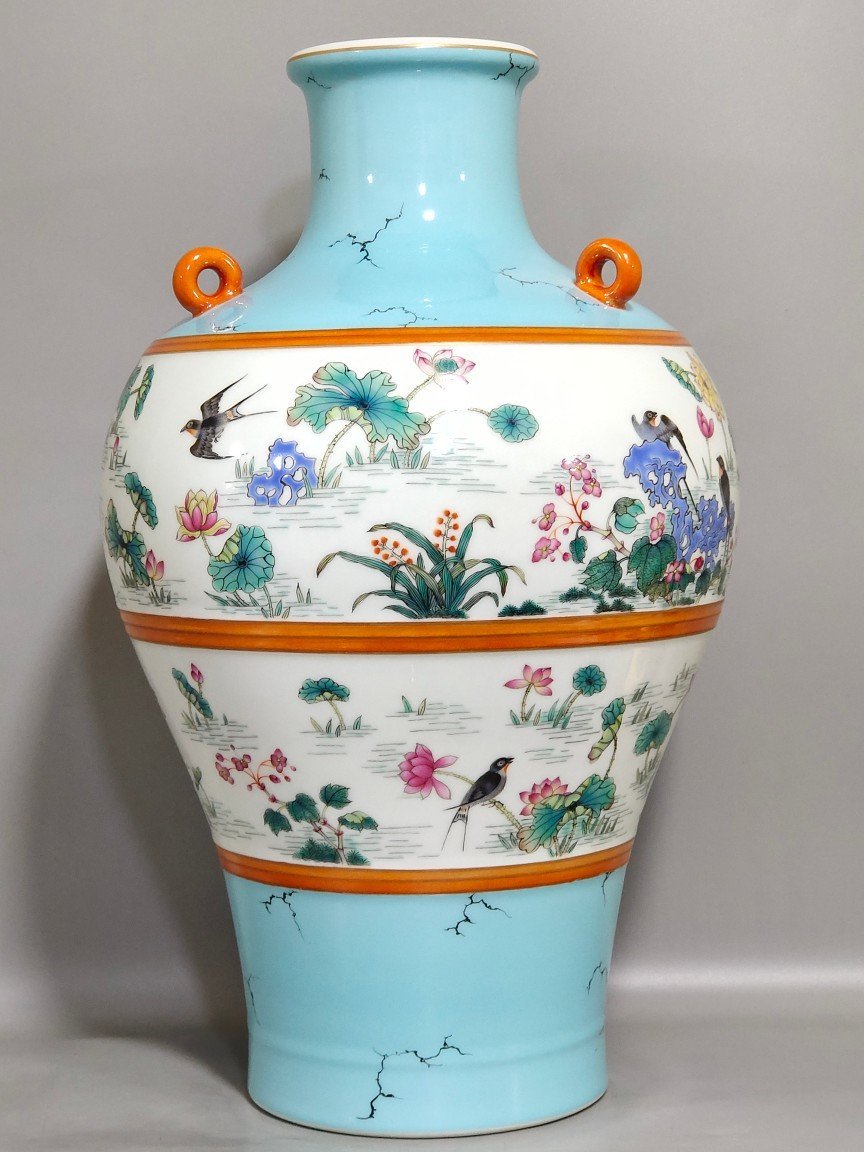 Qing Dynasty Qianlong turquoise green lotus spring swallow plum vase