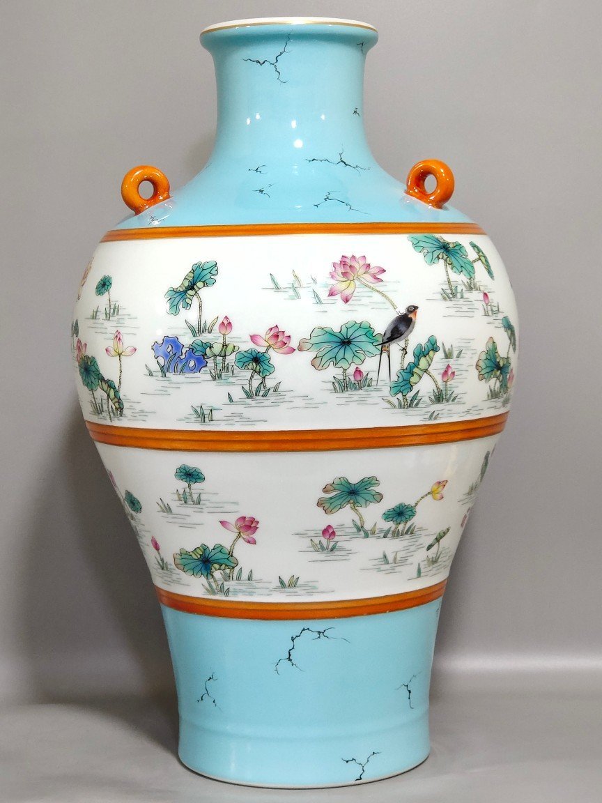 Qing Dynasty Qianlong turquoise green lotus spring swallow plum vase