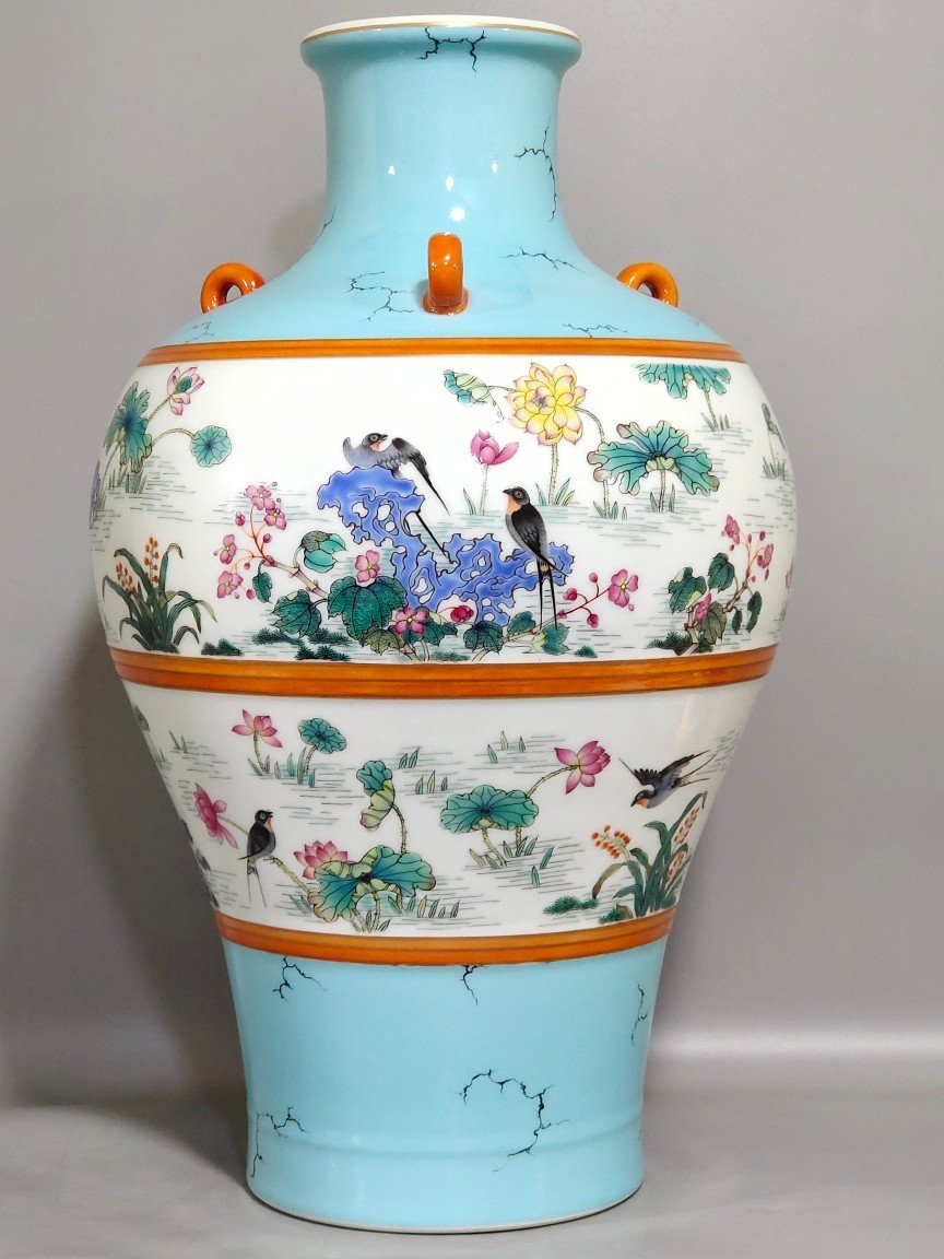 Qing Dynasty Qianlong turquoise green lotus spring swallow plum vase