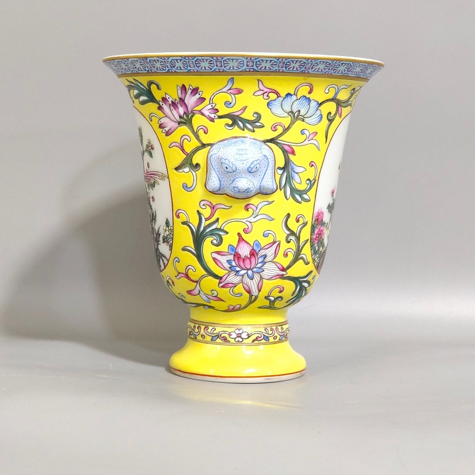 Qing Dynasty Qianlong lemon yellow window flower and bird goblet