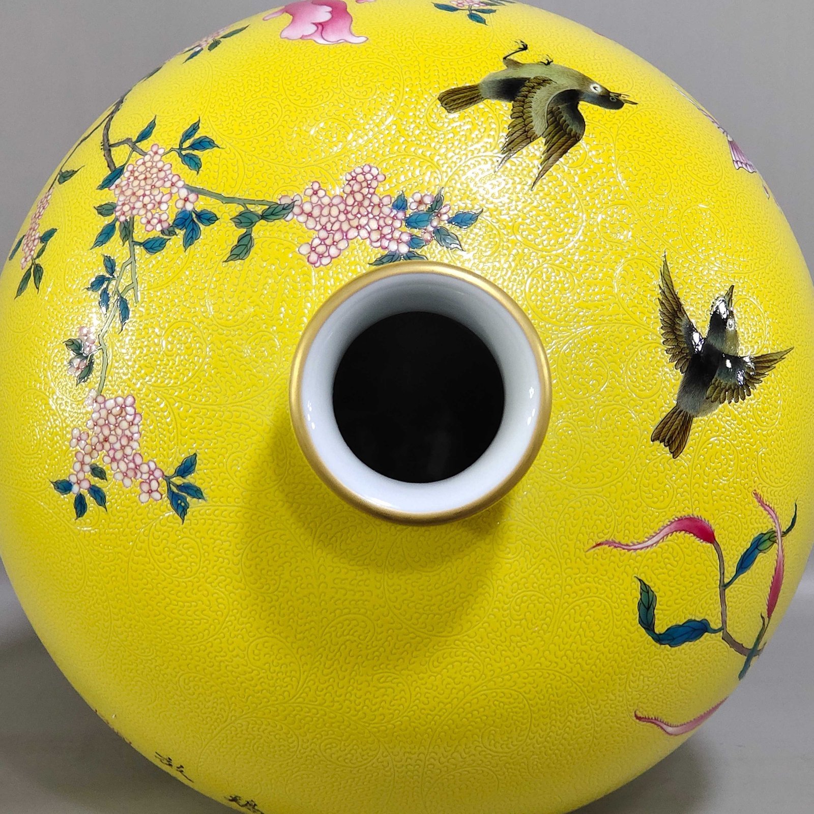 Qing Dynasty Qianlong lemon yellow glazed plum vase