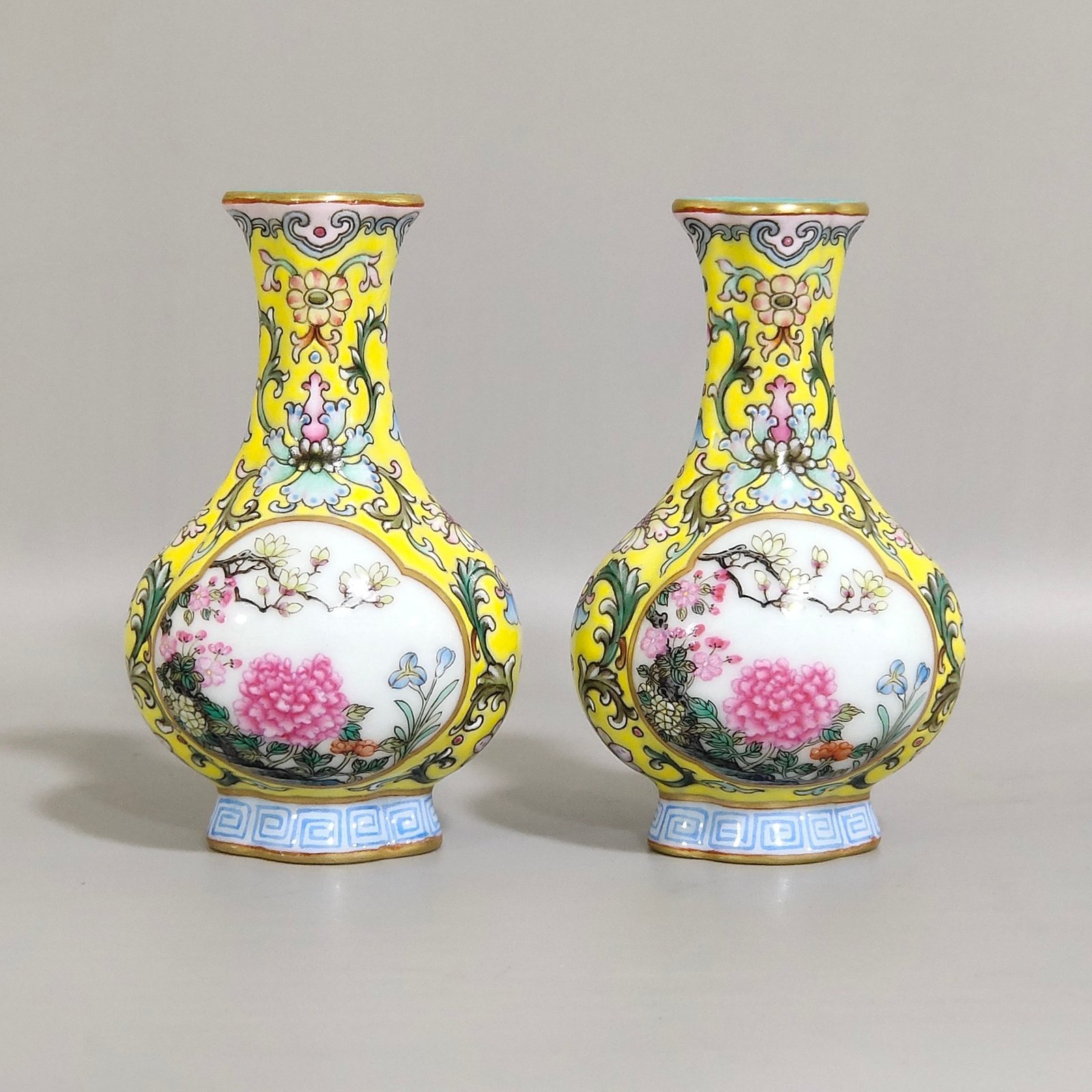 Qing Dynasty Qianlong Yangcai yellow ground windowed small begonia-shaped vase