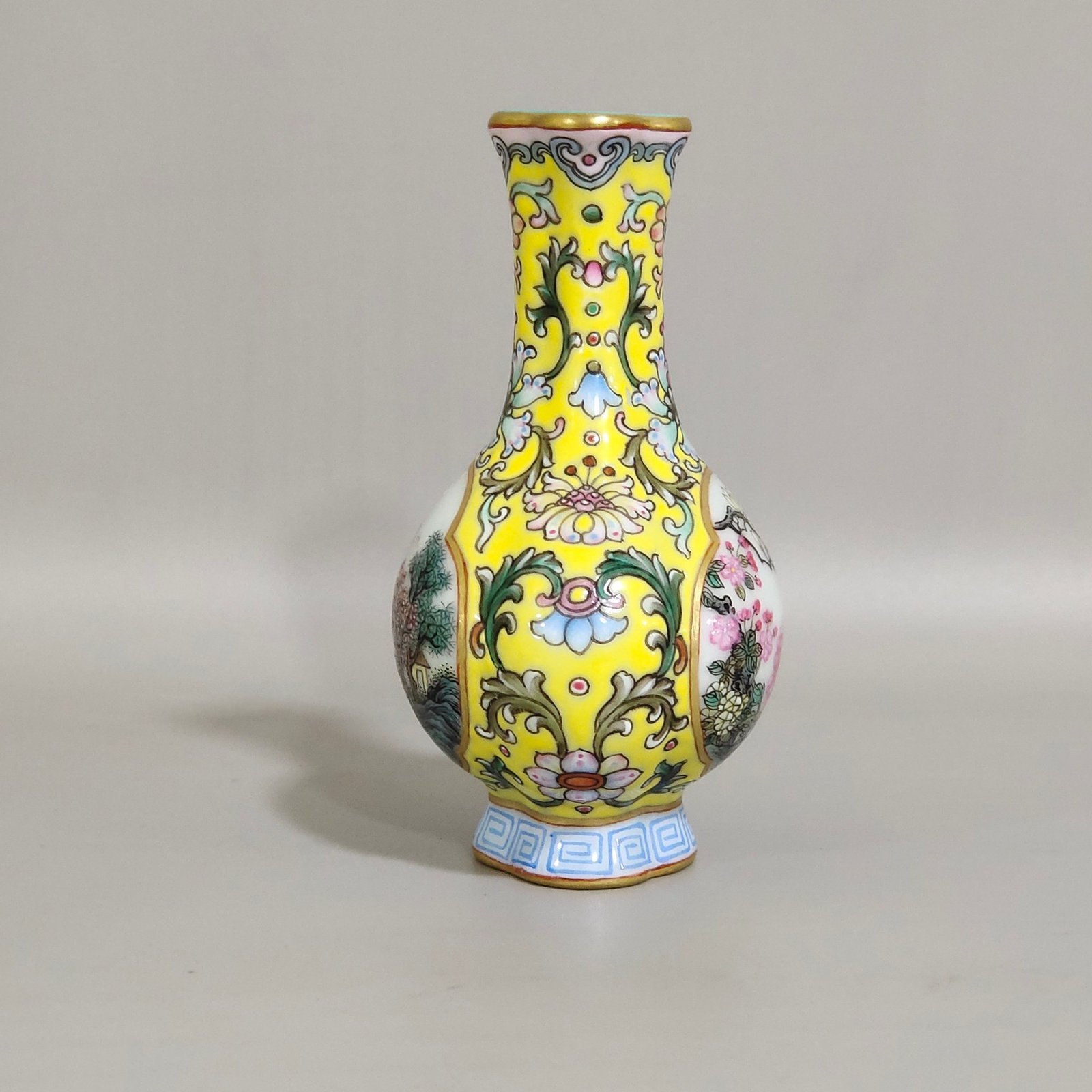Qing Dynasty Qianlong Yangcai yellow ground windowed small begonia-shaped vase