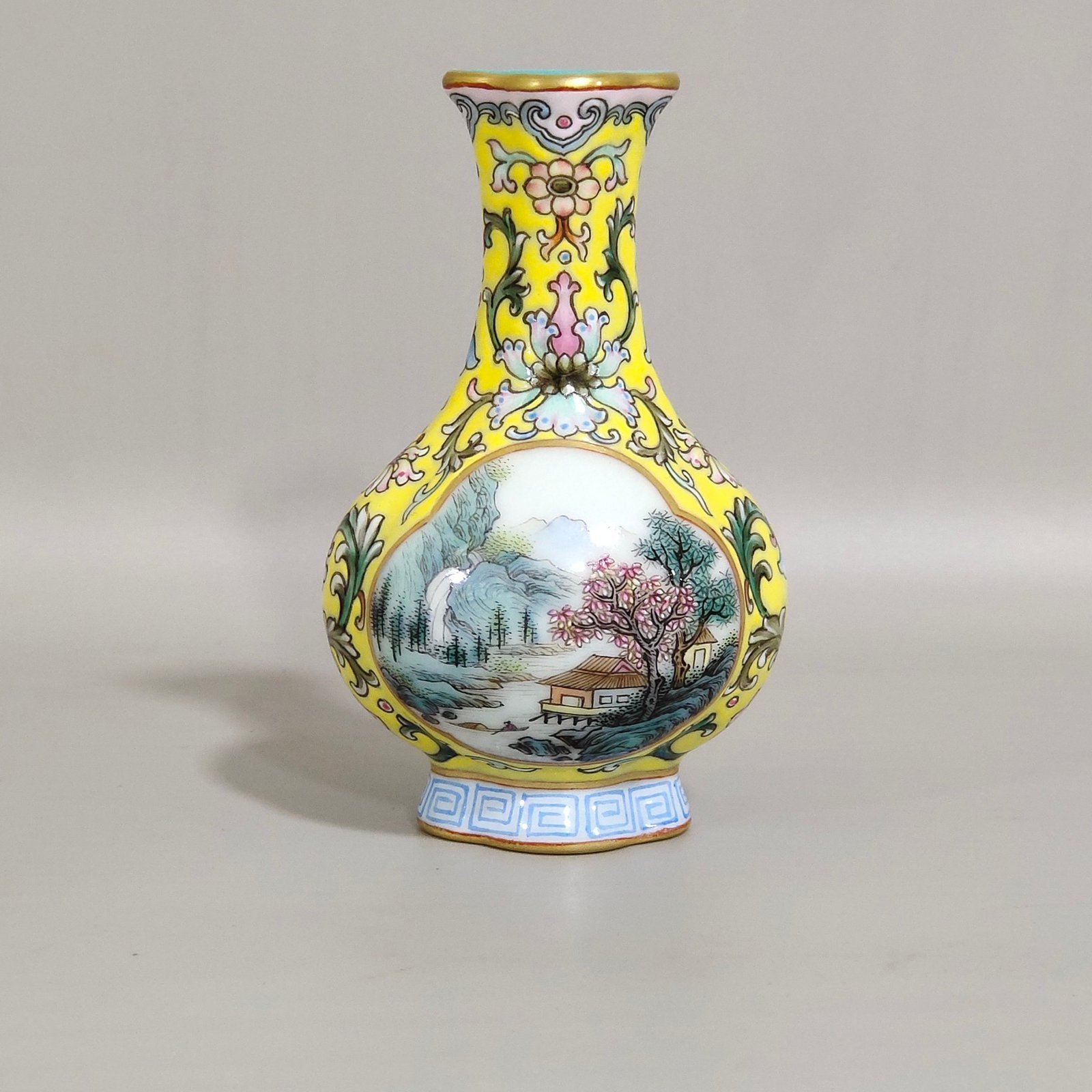 Qing Dynasty Qianlong Yangcai yellow ground windowed small begonia-shaped vase