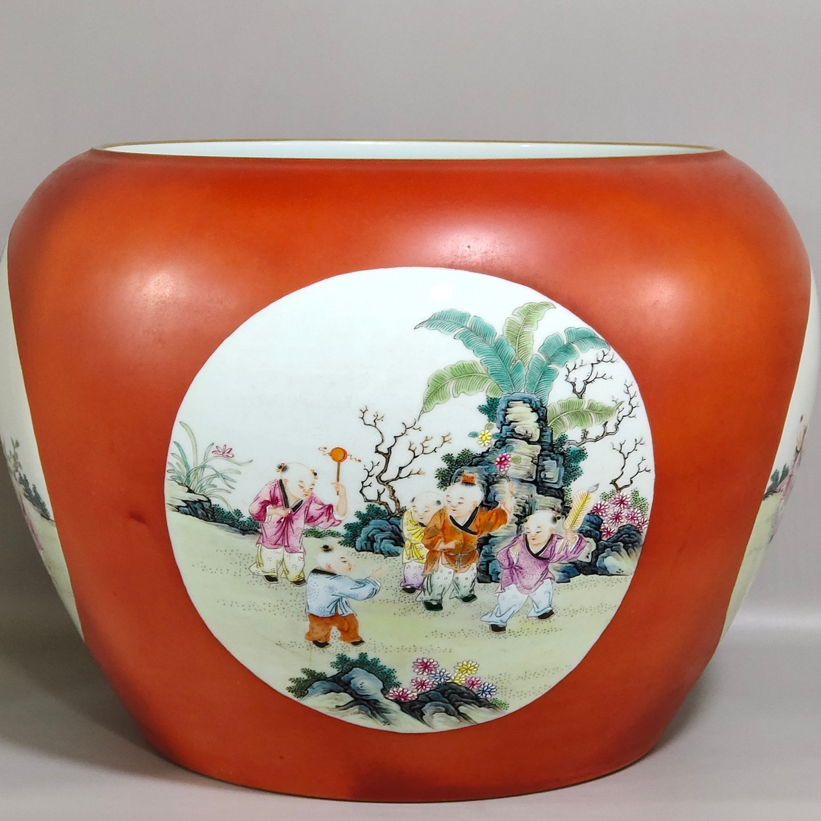 Qing Dynasty Qianlong Coral red apple vat with window showing baby playing