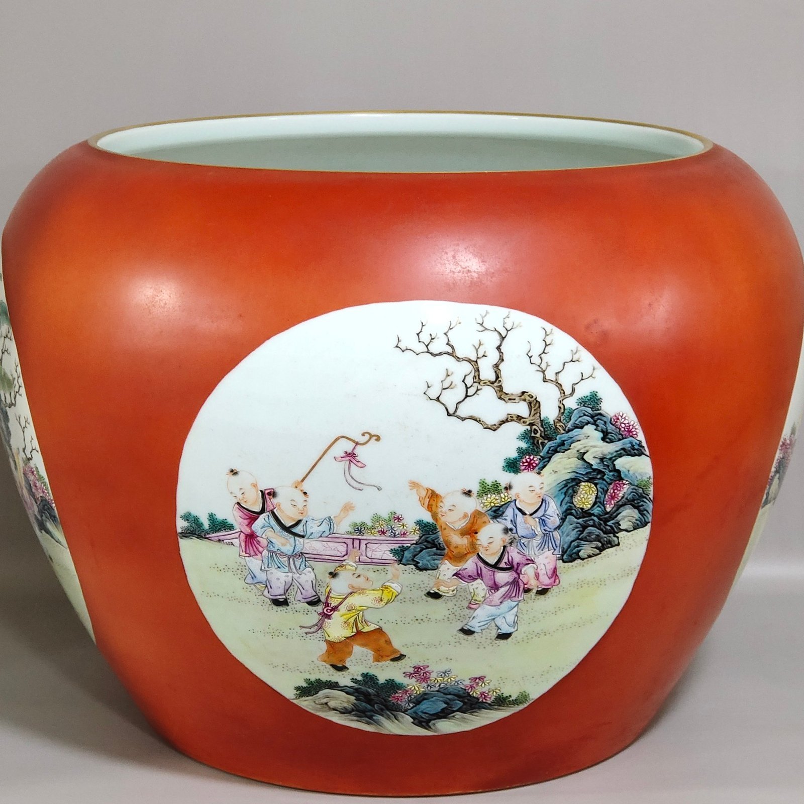 Qing Dynasty Qianlong Coral red apple vat with window showing baby playing