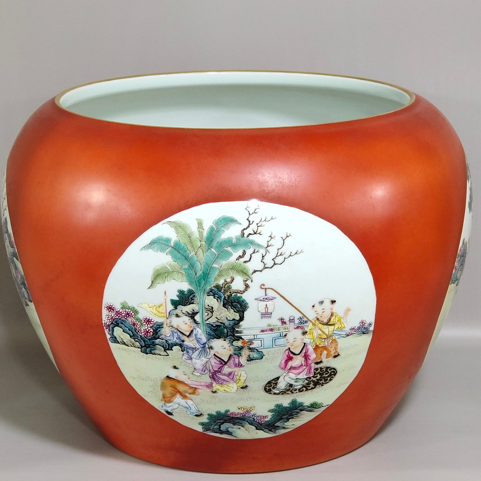 Qing Dynasty Qianlong Coral red apple vat with window showing baby playing