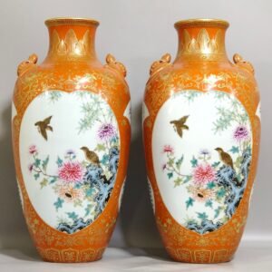 Qing Dynasty Qianlong a coral-red and gold-painted window flower bird and bat-eared vase
