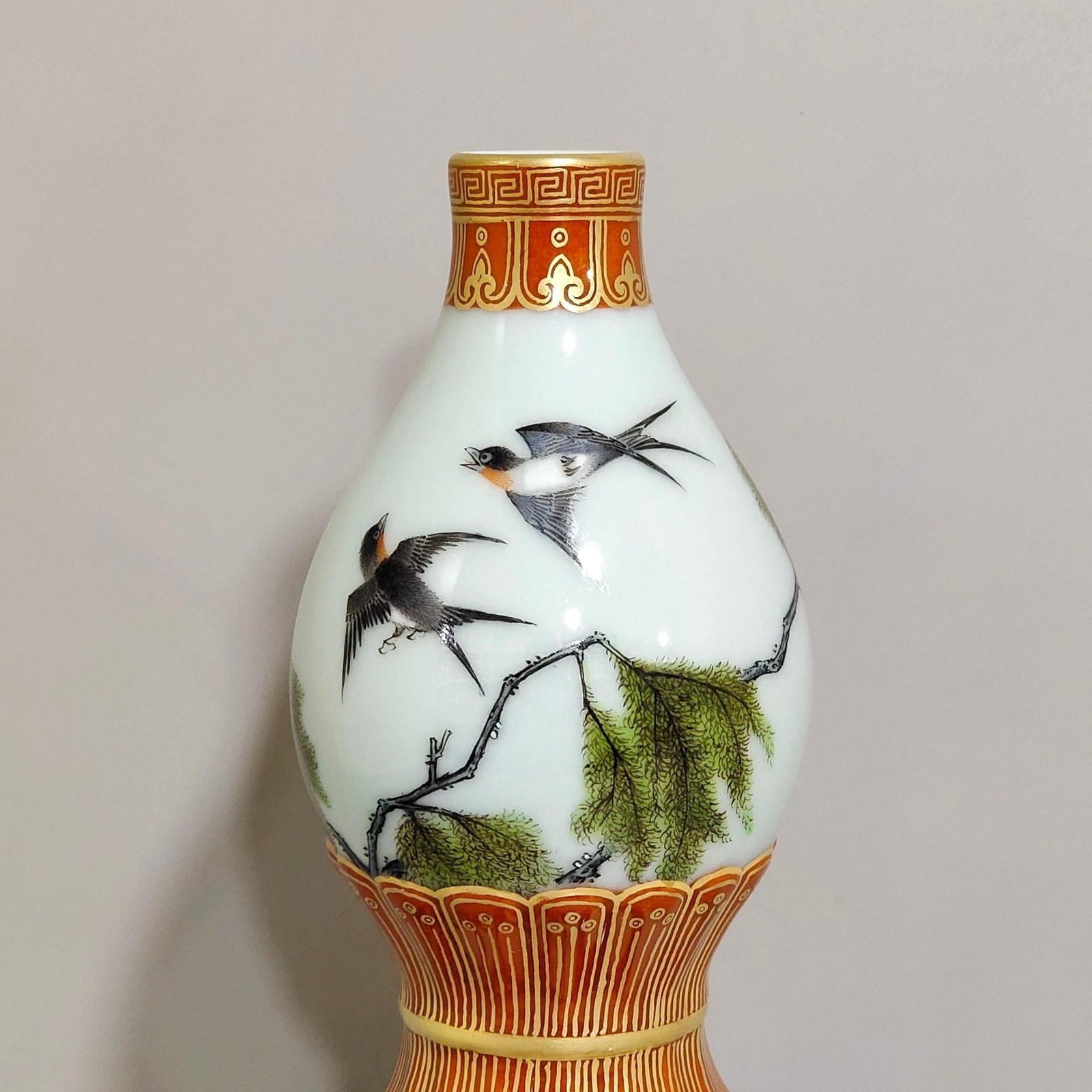 Qing Dynasty Qianlong a coral-red and gold-painted gourd vase