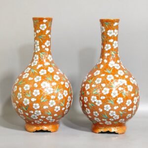 Qing Dynasty Qianlong Coral red plum blossom and bamboo leaf vase