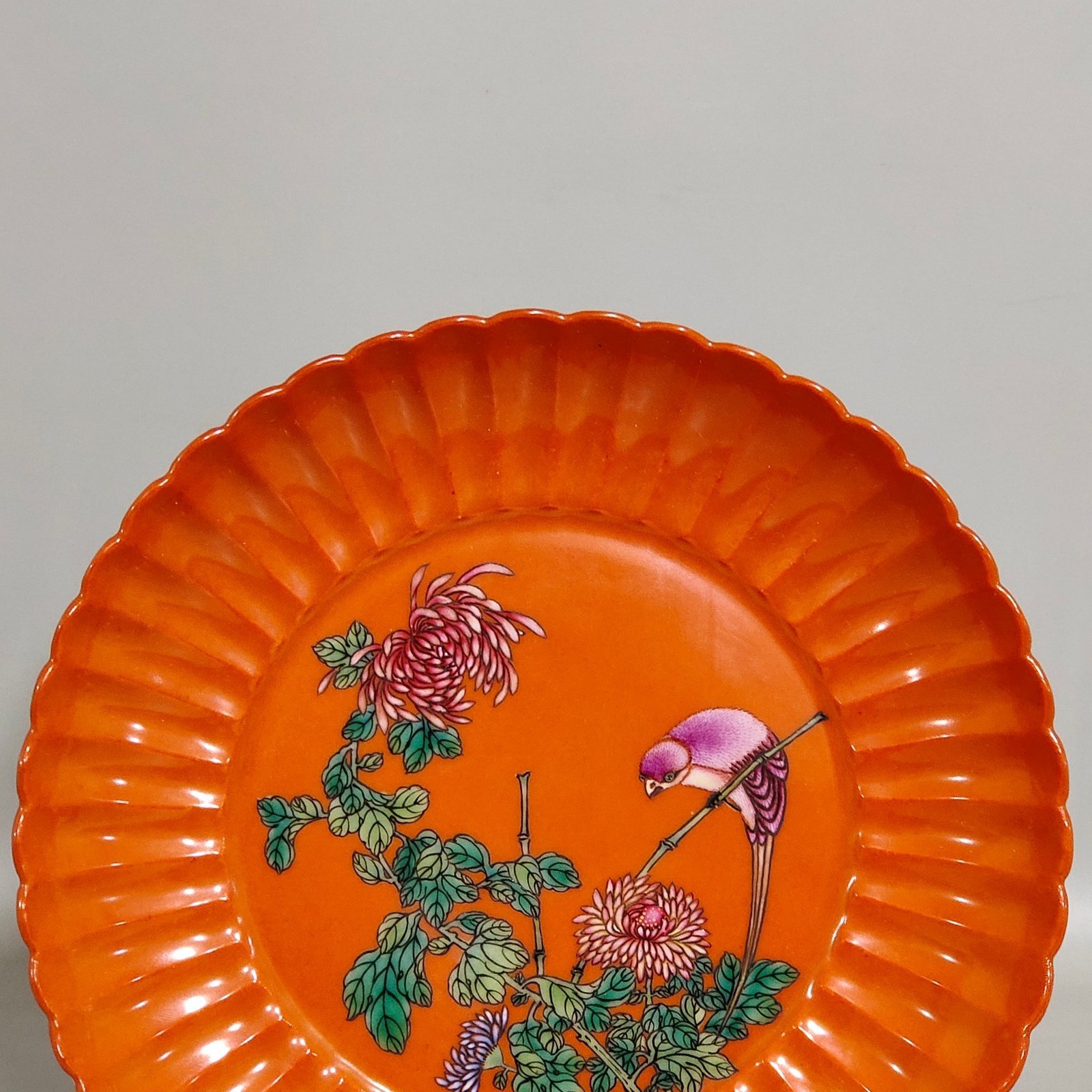 Qing Dynasty Qianlong coral red flower bird and melon prismatic dish