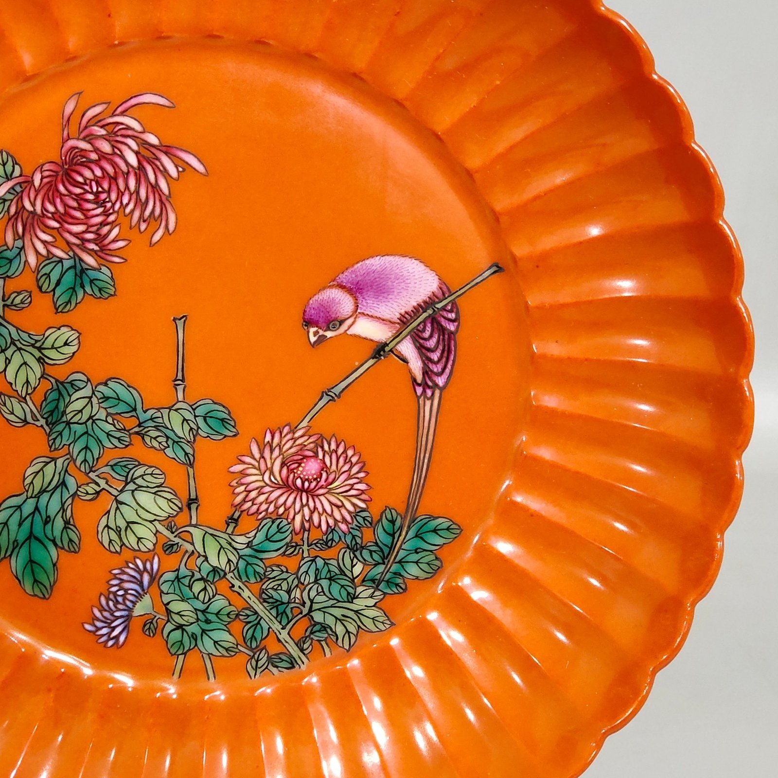 Qing Dynasty Qianlong coral red flower bird and melon prismatic dish