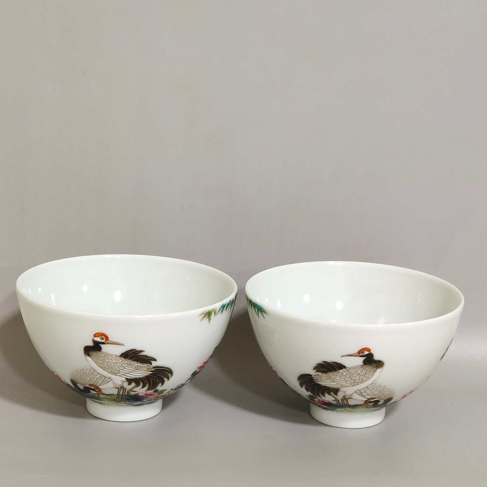 Qing Dynasty Qianlong enamel red-crowned crane rose green bamboo and poem chicken heart cup