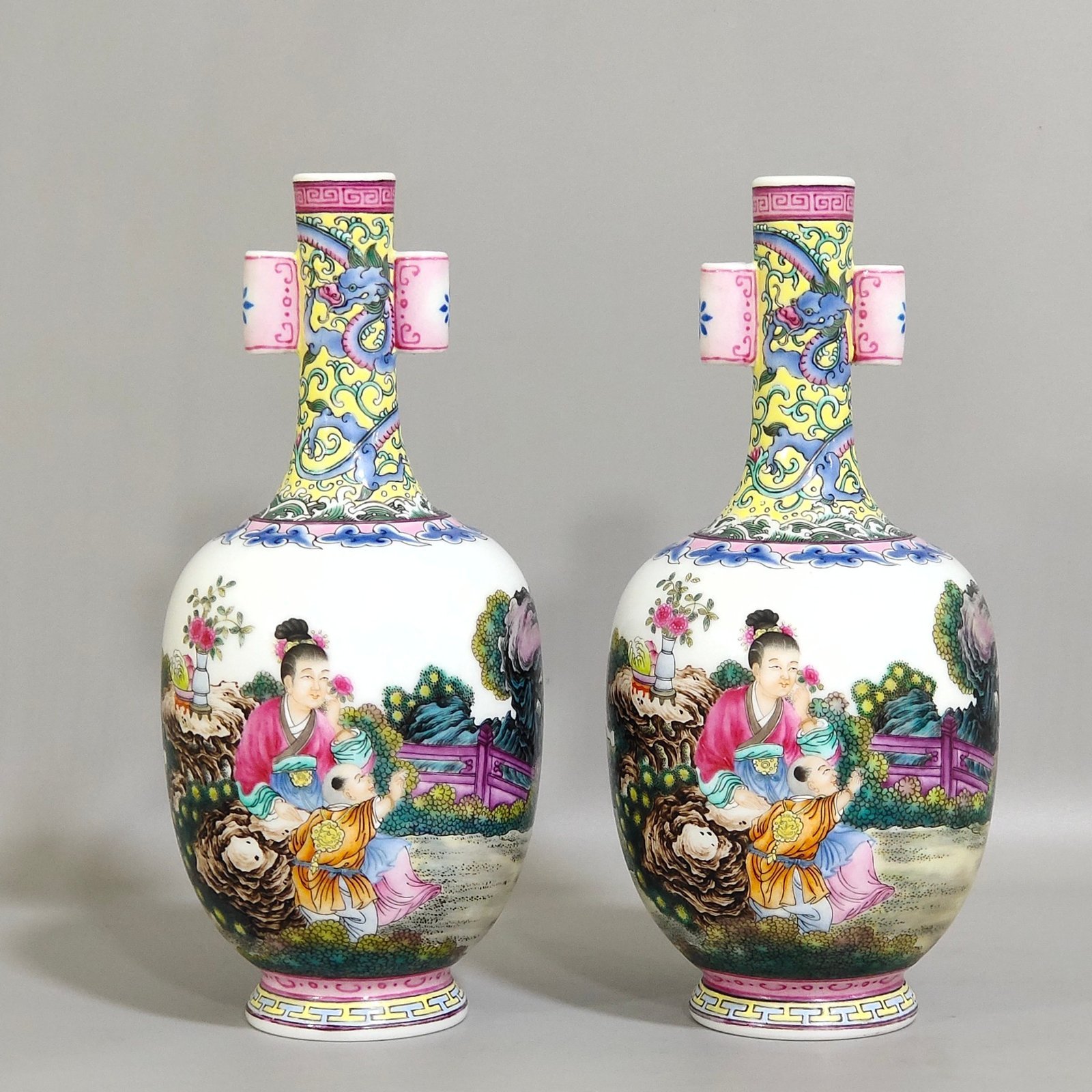 Qing Dynasty Qianlong enamel double-eared vase with a picture of a lady with a belt