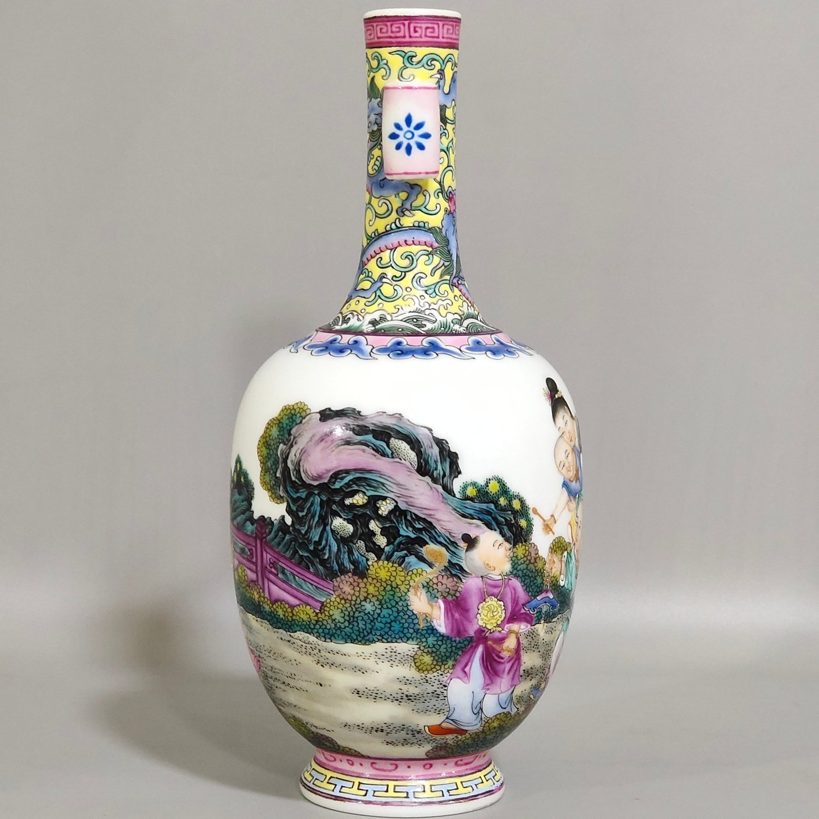 Qing Dynasty Qianlong enamel double-eared vase with a picture of a lady with a belt