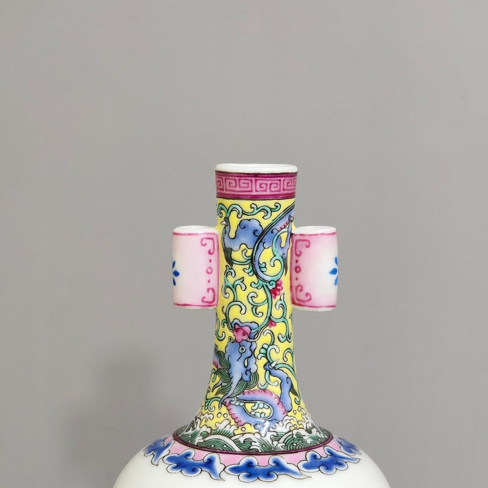 Qing Dynasty Qianlong enamel double-eared vase with a picture of a lady with a belt