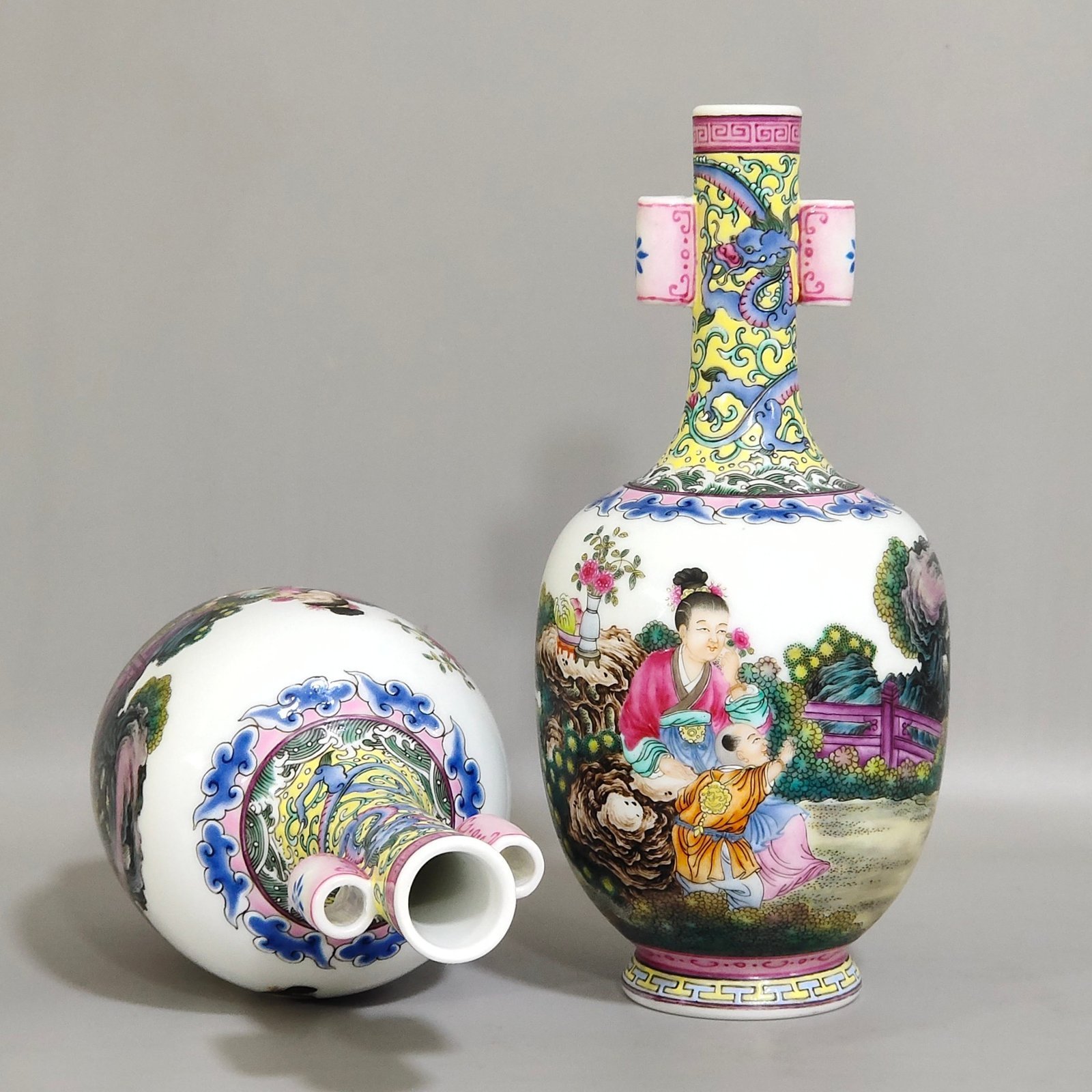 Qing Dynasty Qianlong enamel double-eared vase with a picture of a lady with a belt