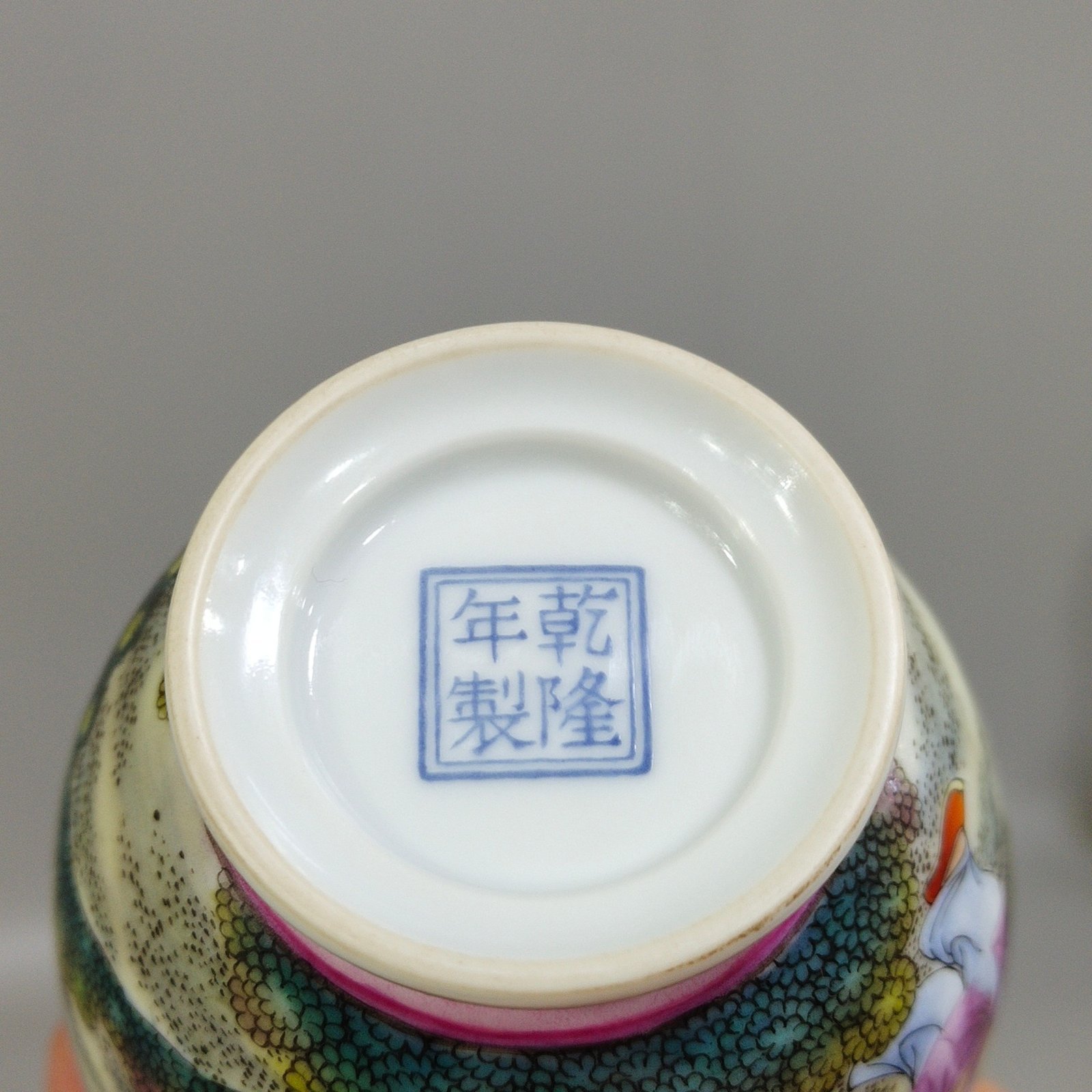 Qing Dynasty Qianlong enamel double-eared vase with a picture of a lady with a belt