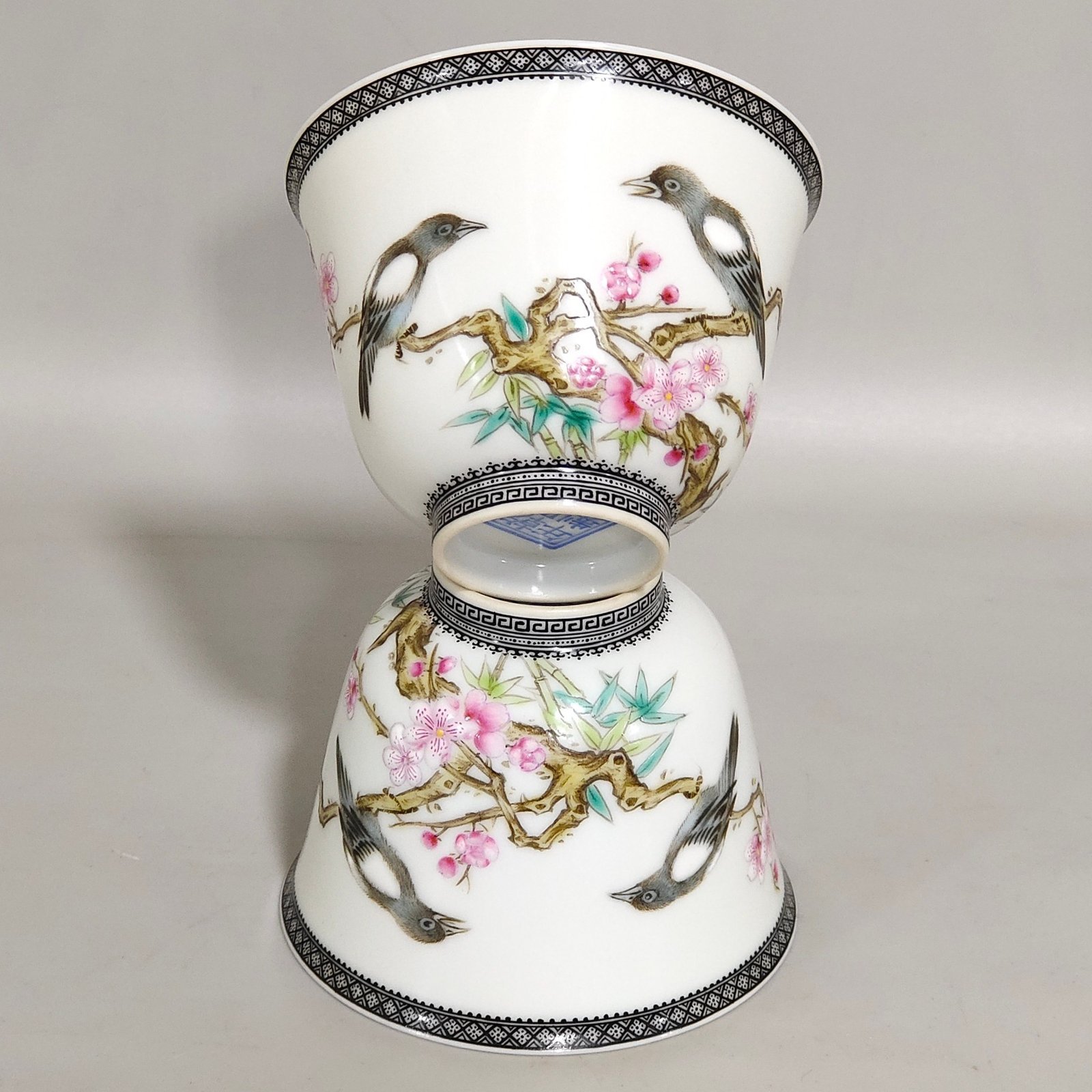 Qing Dynasty Qianlong enamel ink-rimmed cup with poems and flowers and birds