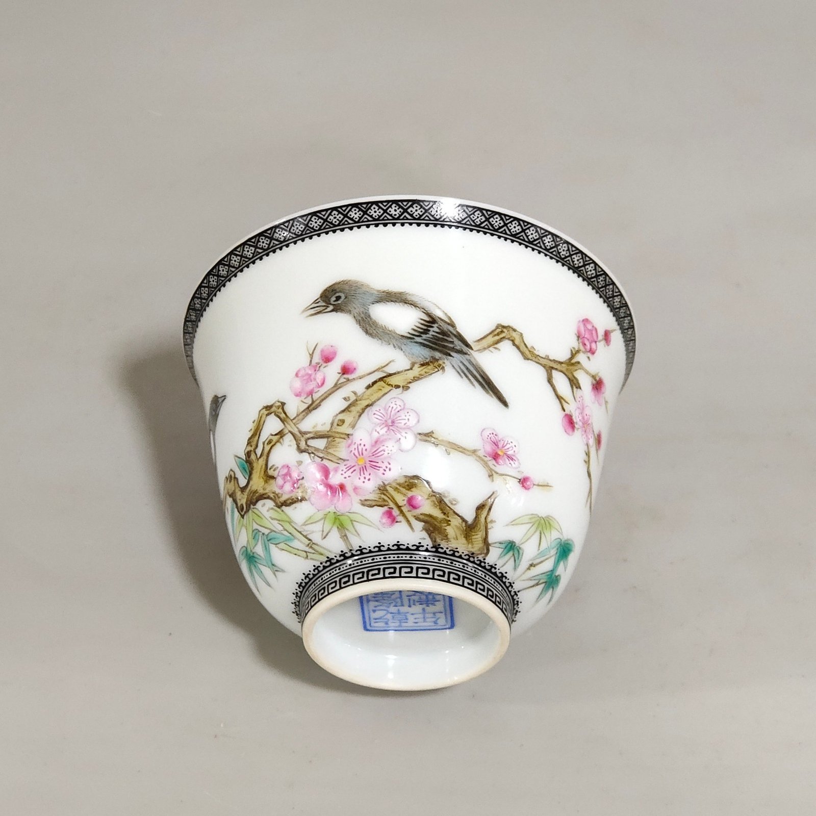 Qing Dynasty Qianlong enamel ink-rimmed cup with poems and flowers and birds