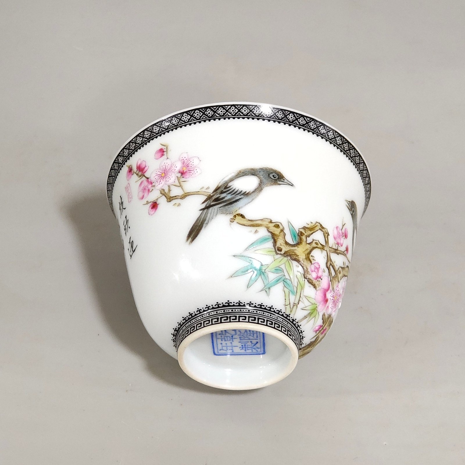 Qing Dynasty Qianlong enamel ink-rimmed cup with poems and flowers and birds