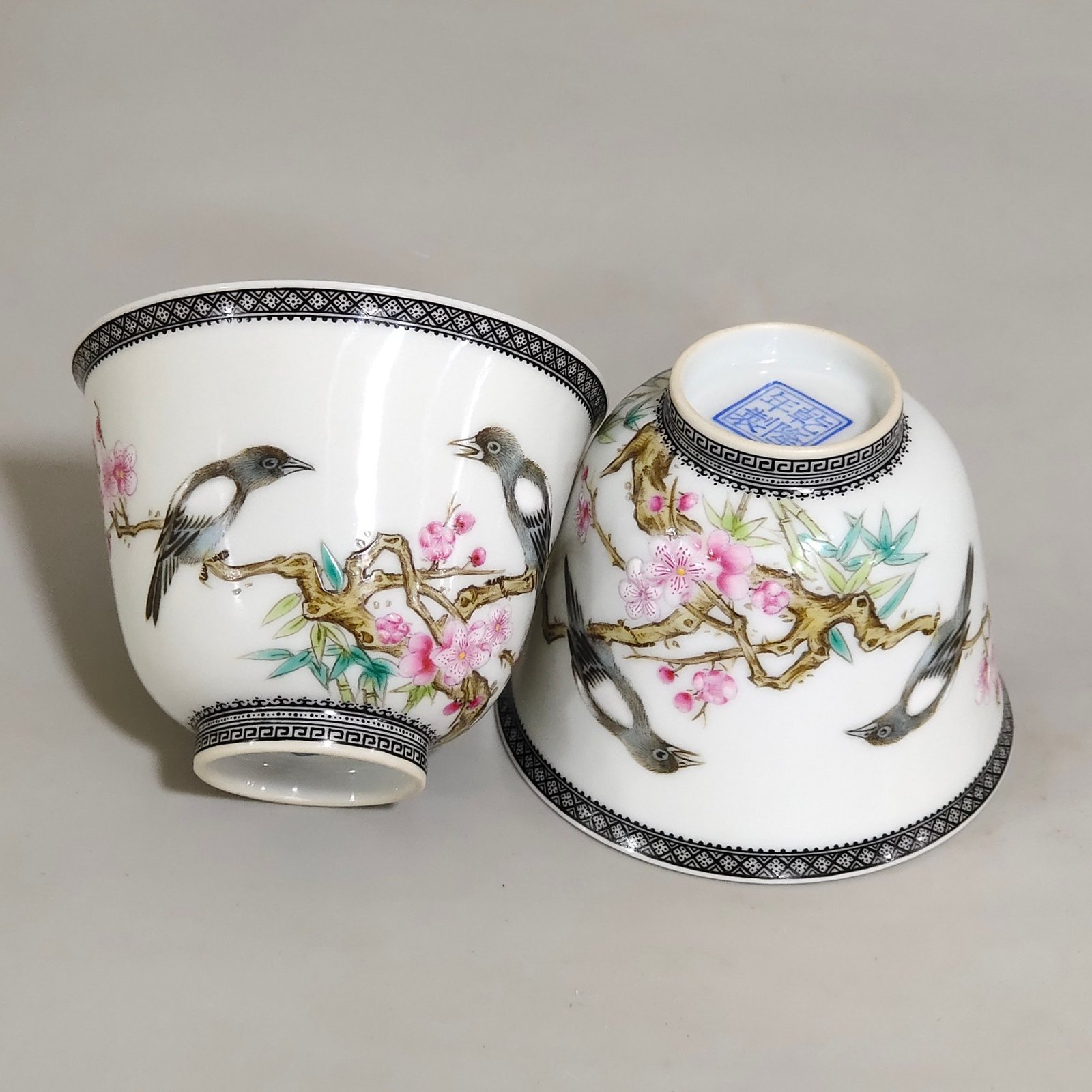 Qing Dynasty Qianlong enamel ink-rimmed cup with poems and flowers and birds