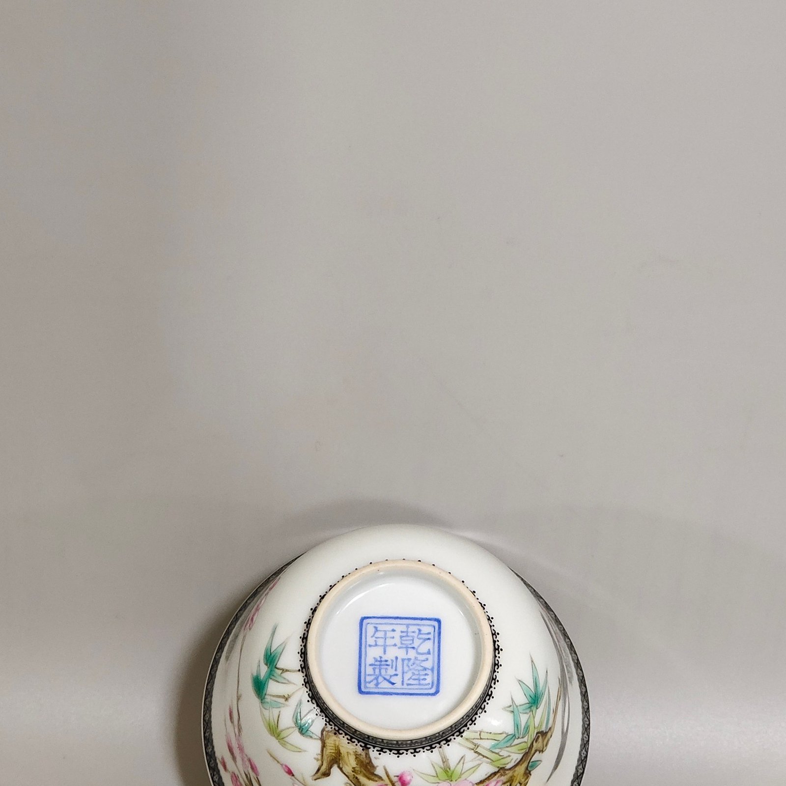 Qing Dynasty Qianlong enamel ink-rimmed cup with poems and flowers and birds