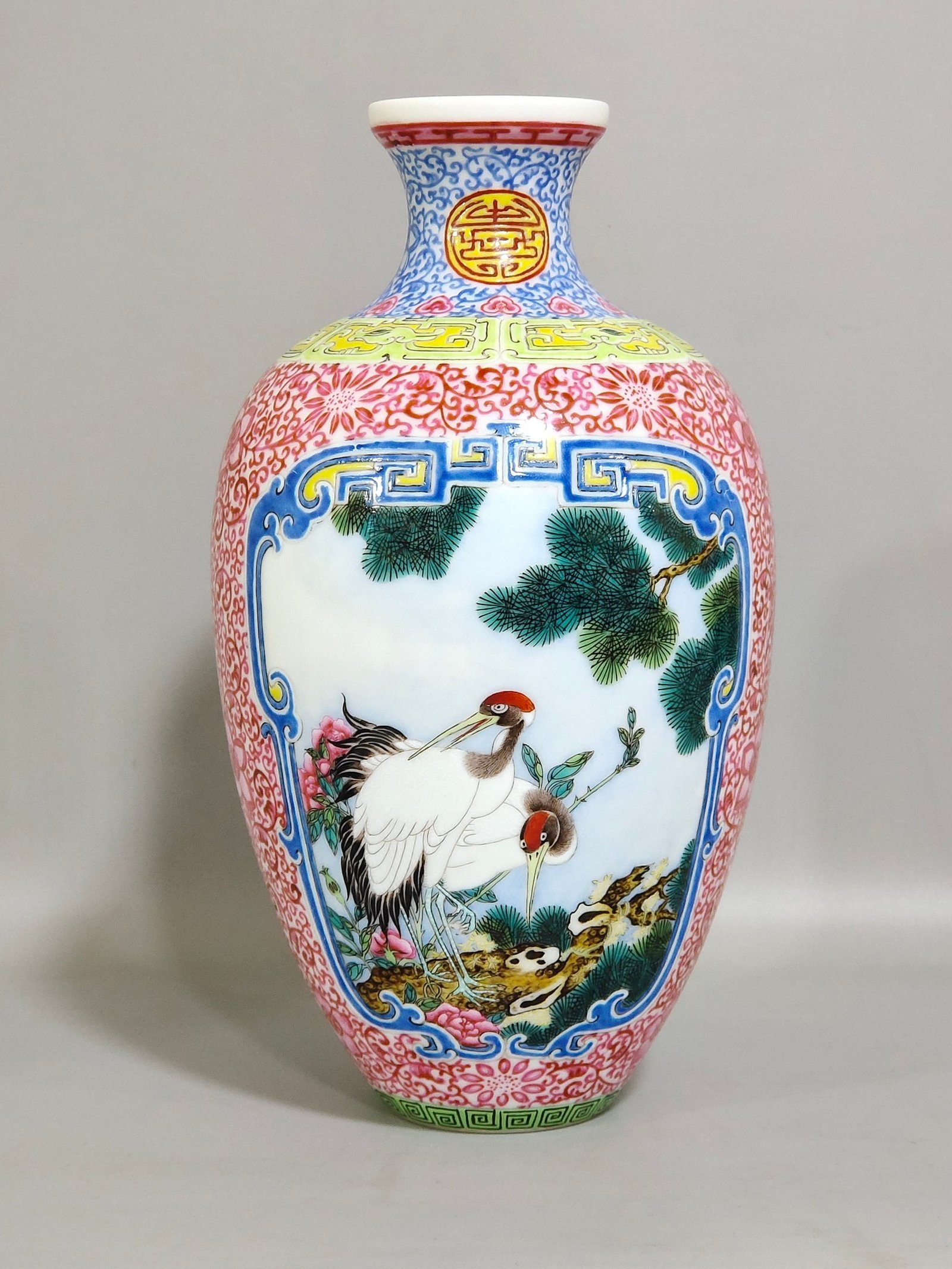 Qing Dynasty Qianlong enamel pine crane golden pheasant and plum vase